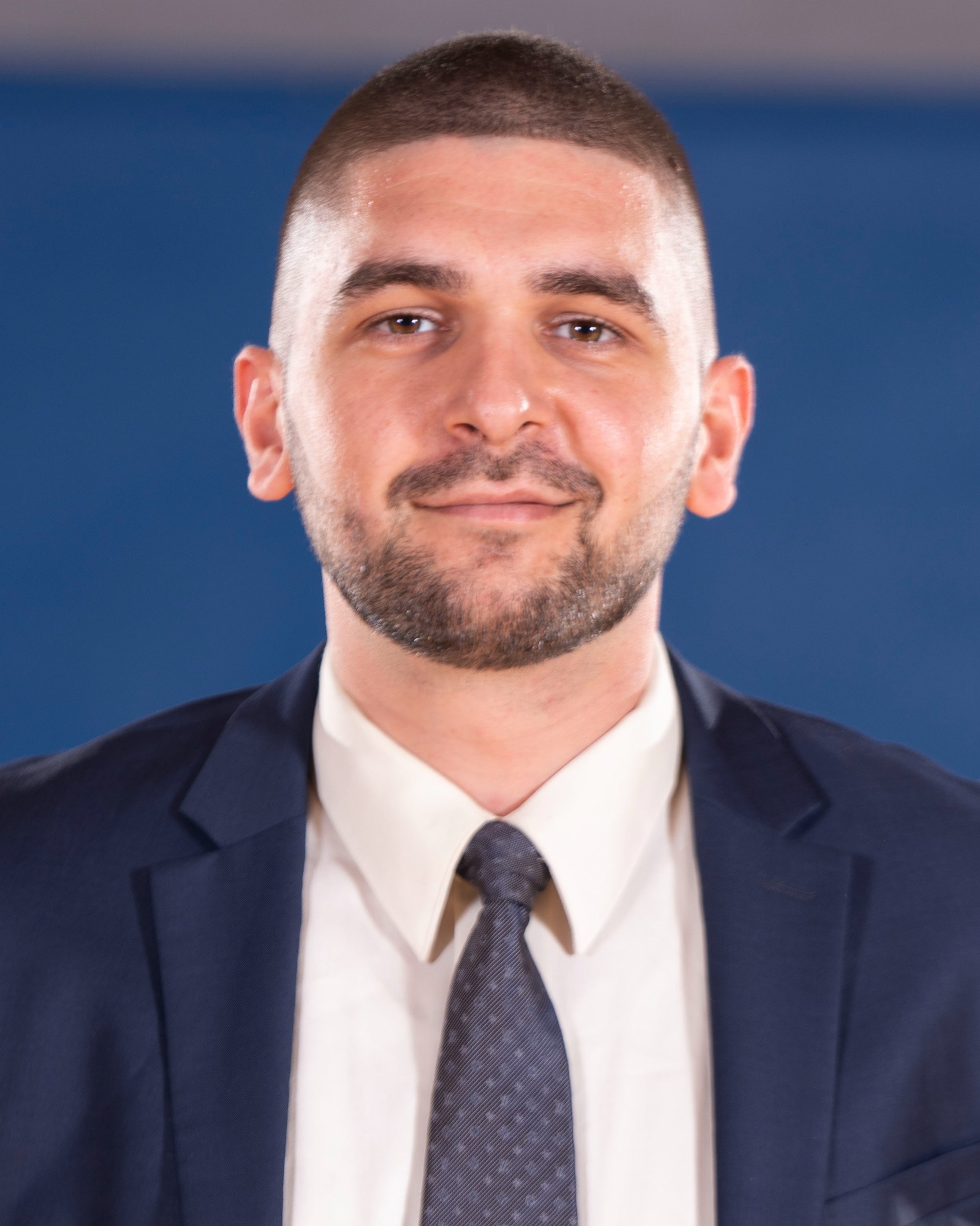 Coach Niz Headshot