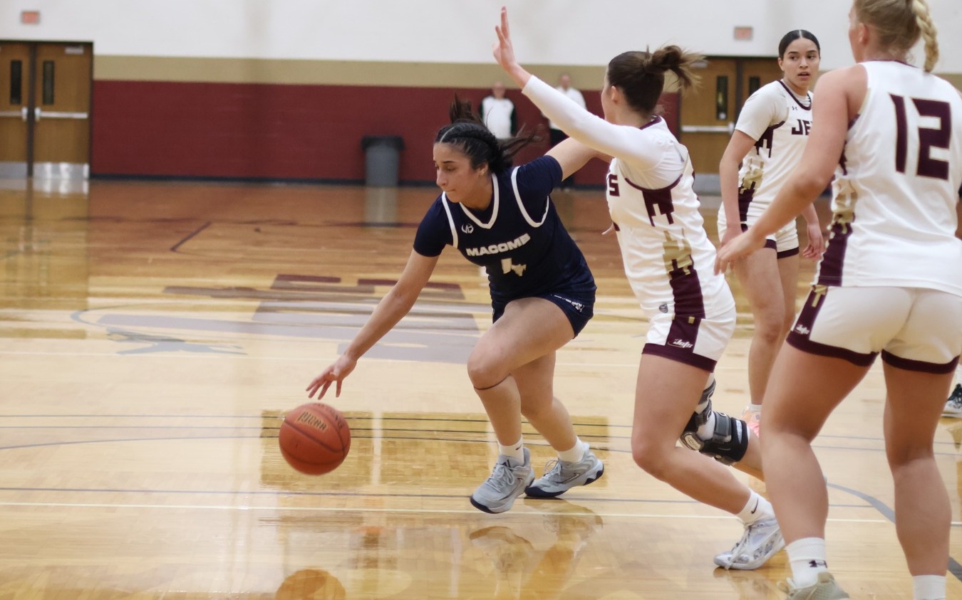 WBB - Hannah Tamou (4) dribbles through the lane at Jackson College (Feb. 24, 2026)