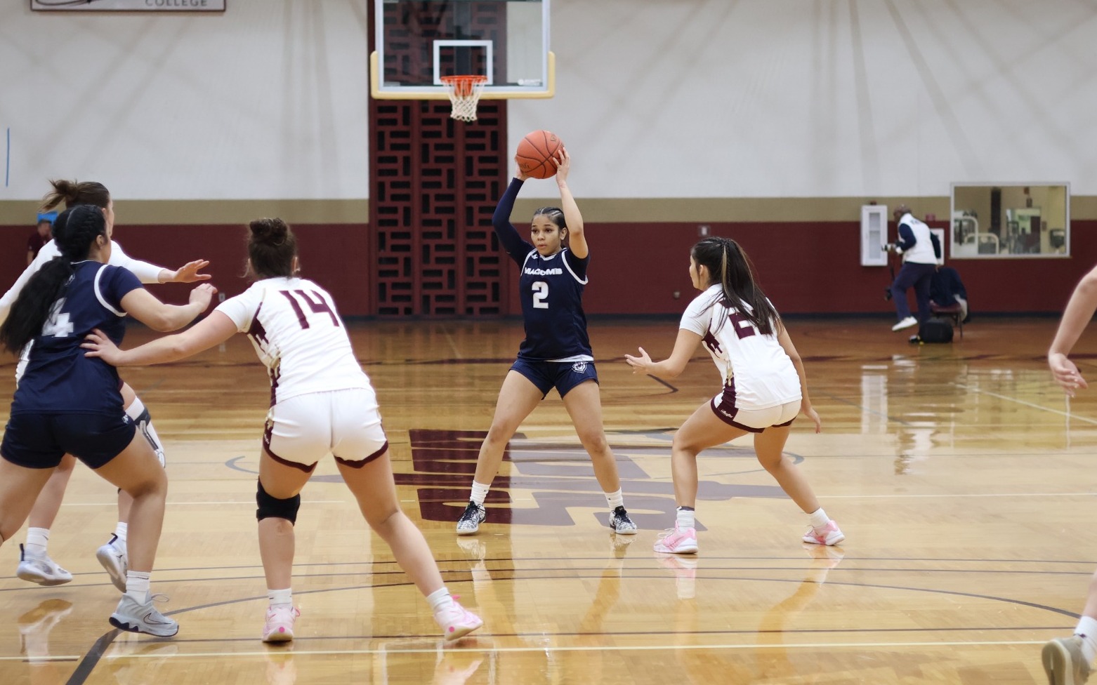 WBB - A'Liyah Forris (2) looks for an open teammate at Jackson
