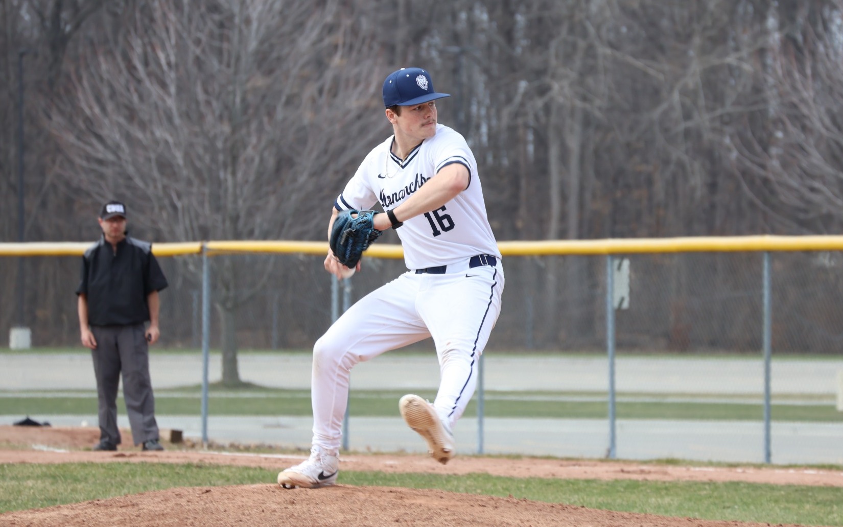 Baseball - Kaiden Pollock (16) pitches at home against Cuyahoga