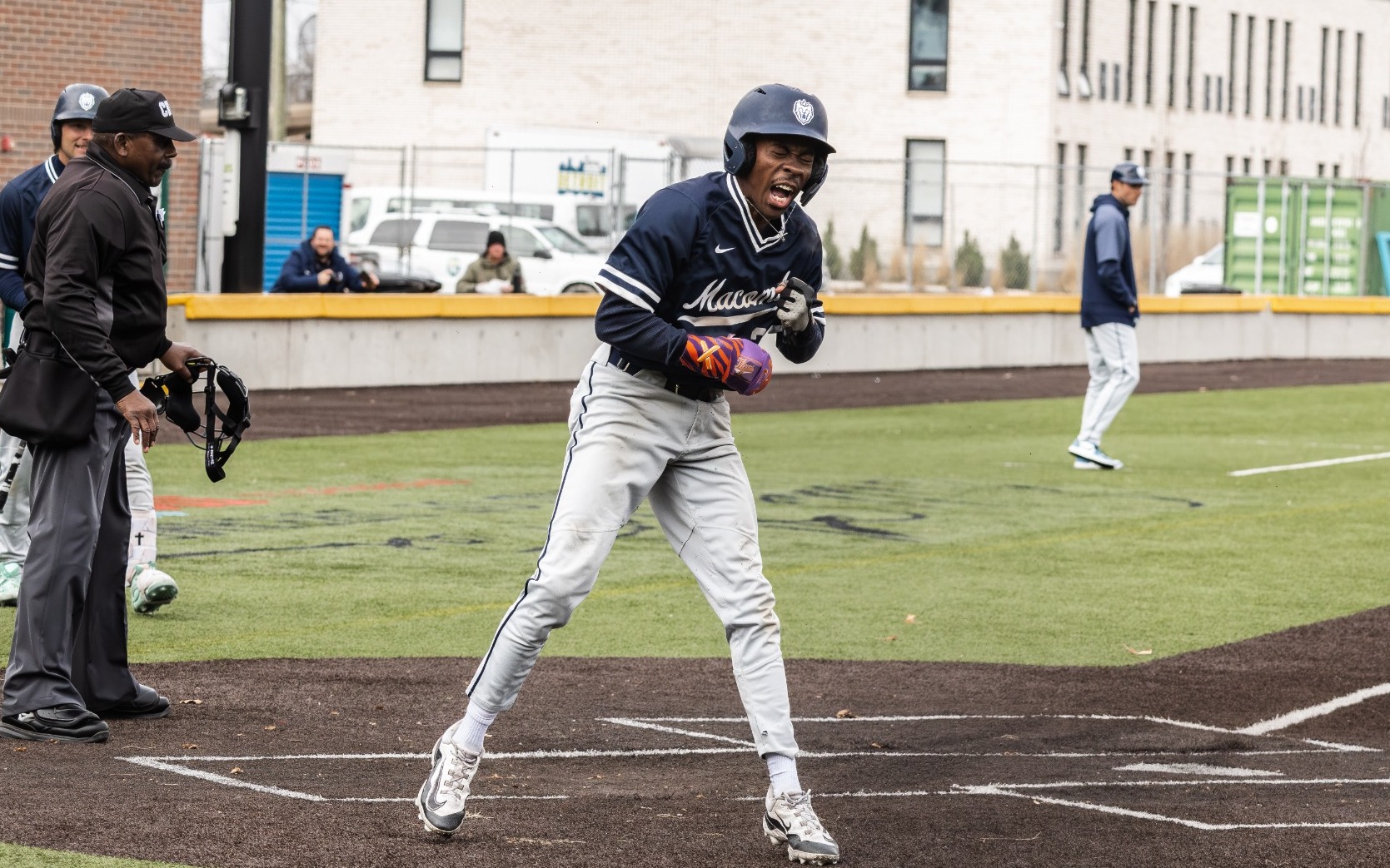 Baseball - Marwynn Matthews Jr. celebrates stealing home at The Corner Ballpark