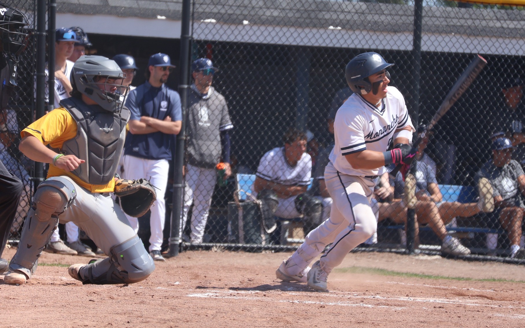 Baseball - Brett Leonard (50) connects on a double at home