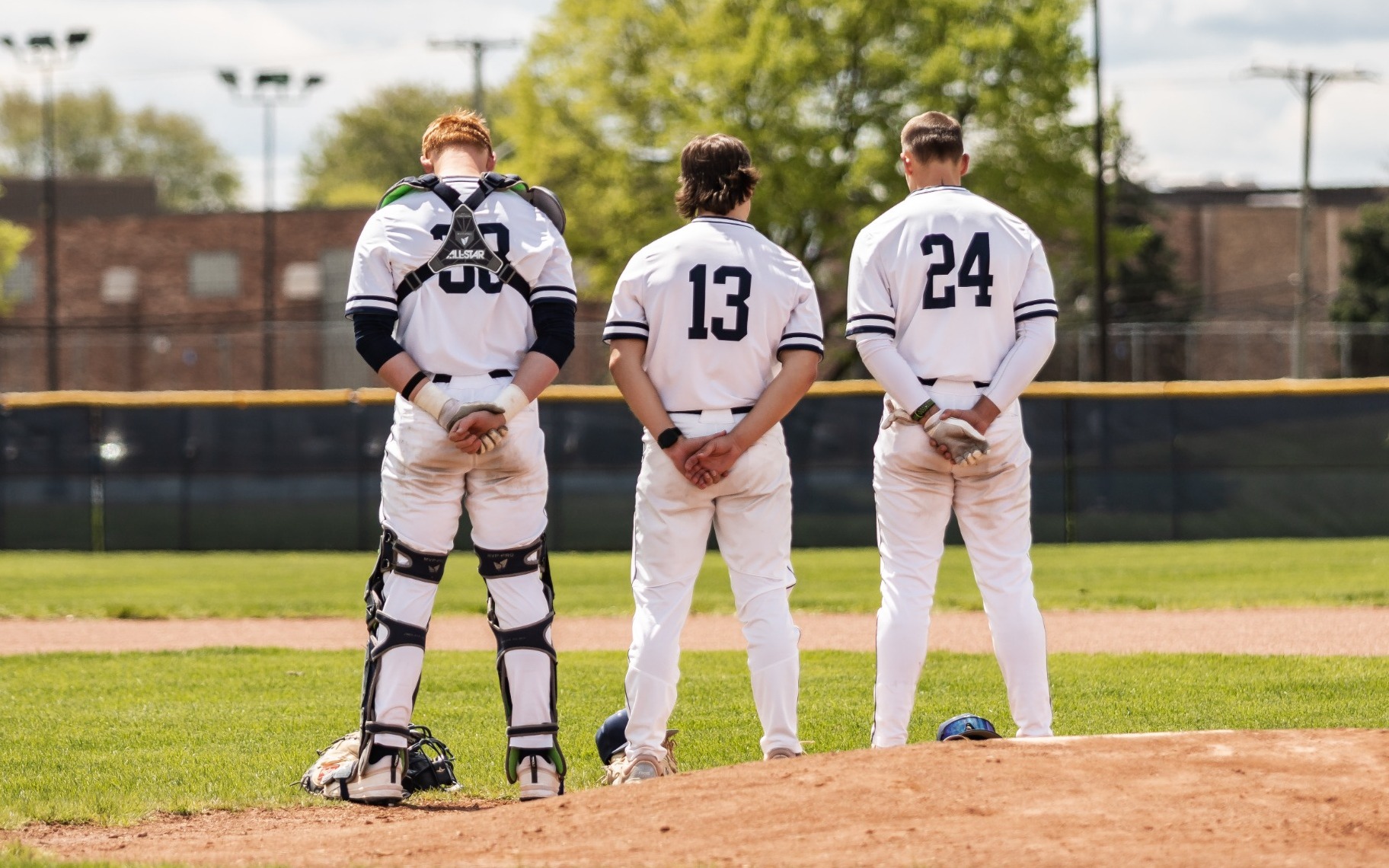 Baseball - Monarchs Stand for National Anthem Pregame