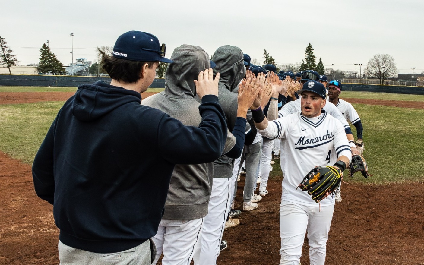 Baseball - Monarchs celebrate win as part of 13-game winning streak
