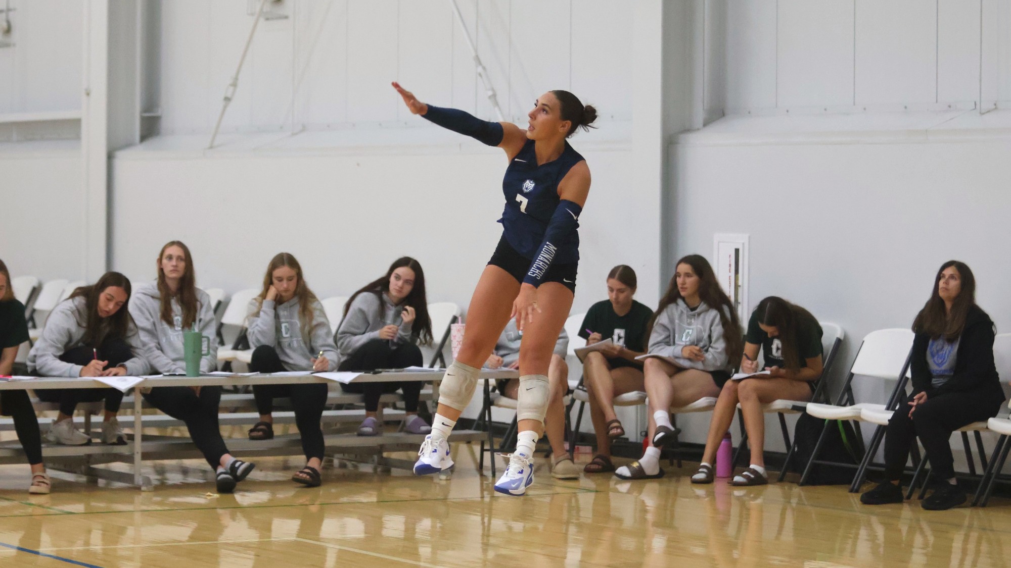 Volleyball - Ava Hunt (7) serves against Southwestern Michigan
