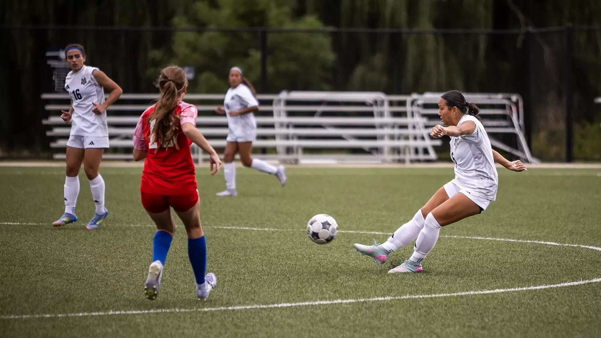 Chloe Voung kicks a ball