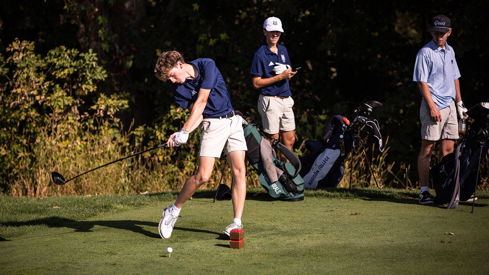 Micah Lenway hits a tee shot