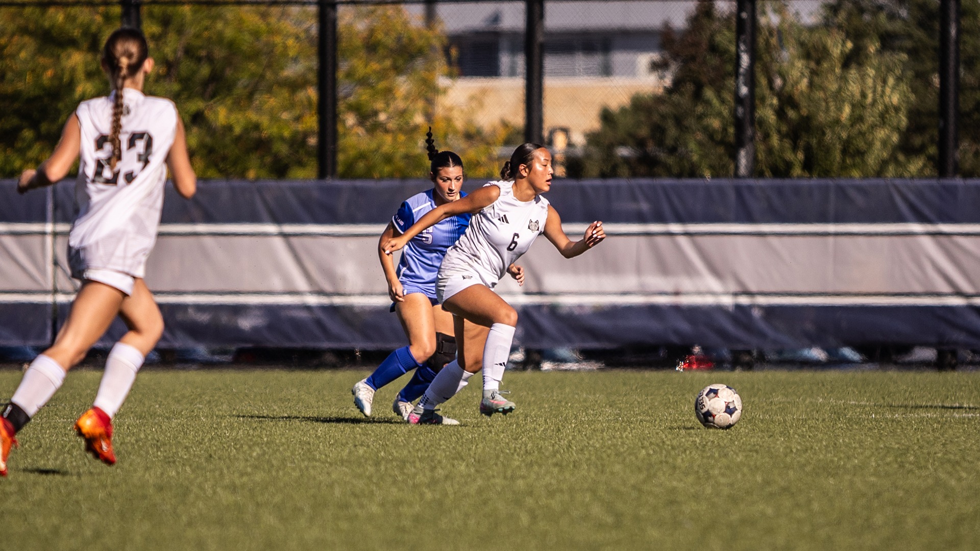 Chloe Voung dribbles past a defender