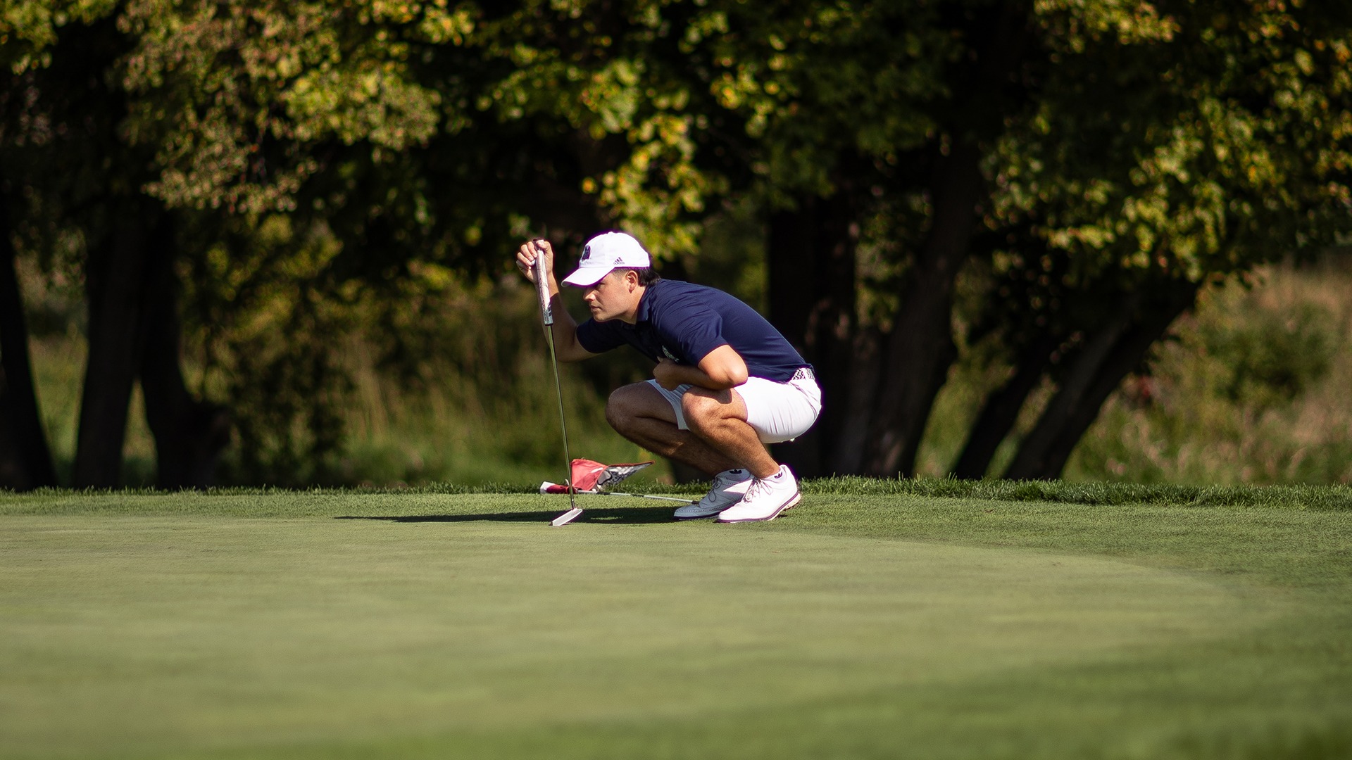 Matthew Haggart lines up a putt
