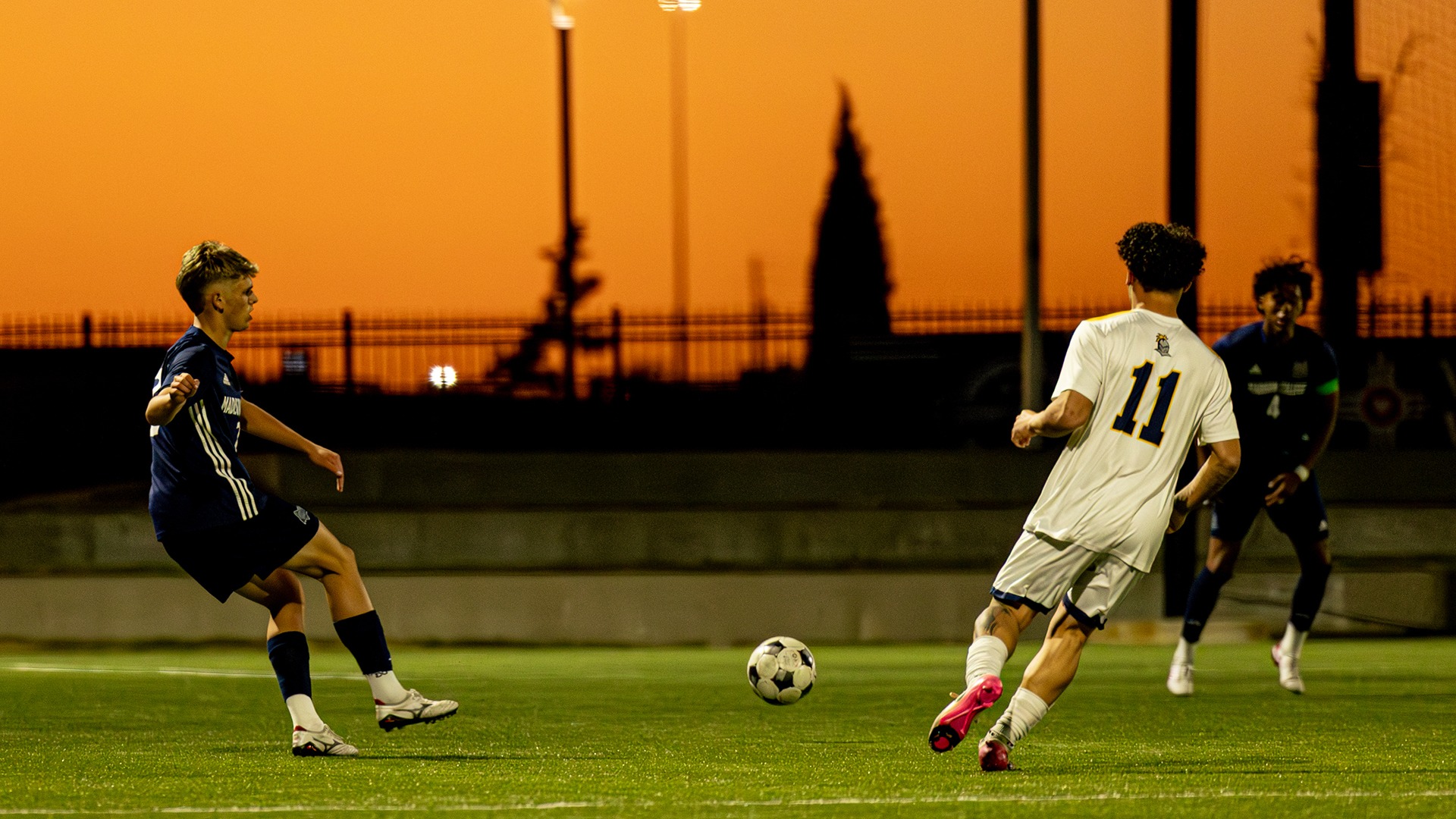 Dan Fox kicks a ball