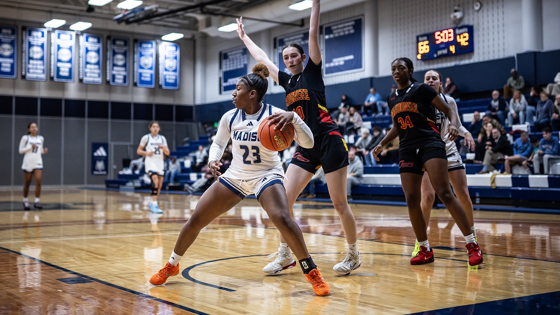 Serinity Metcalfe works the dribble under the basket