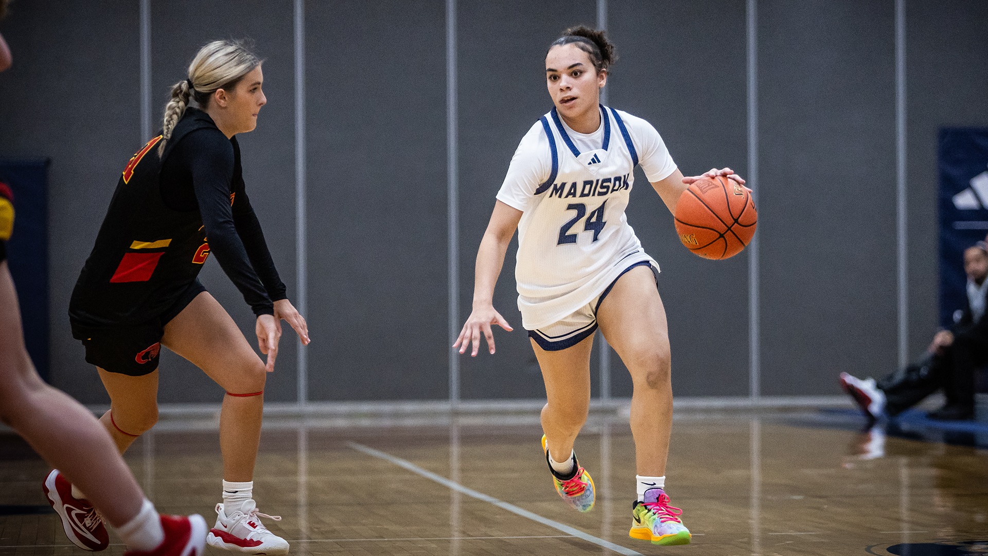 Ava Landrum dribbles the basketball