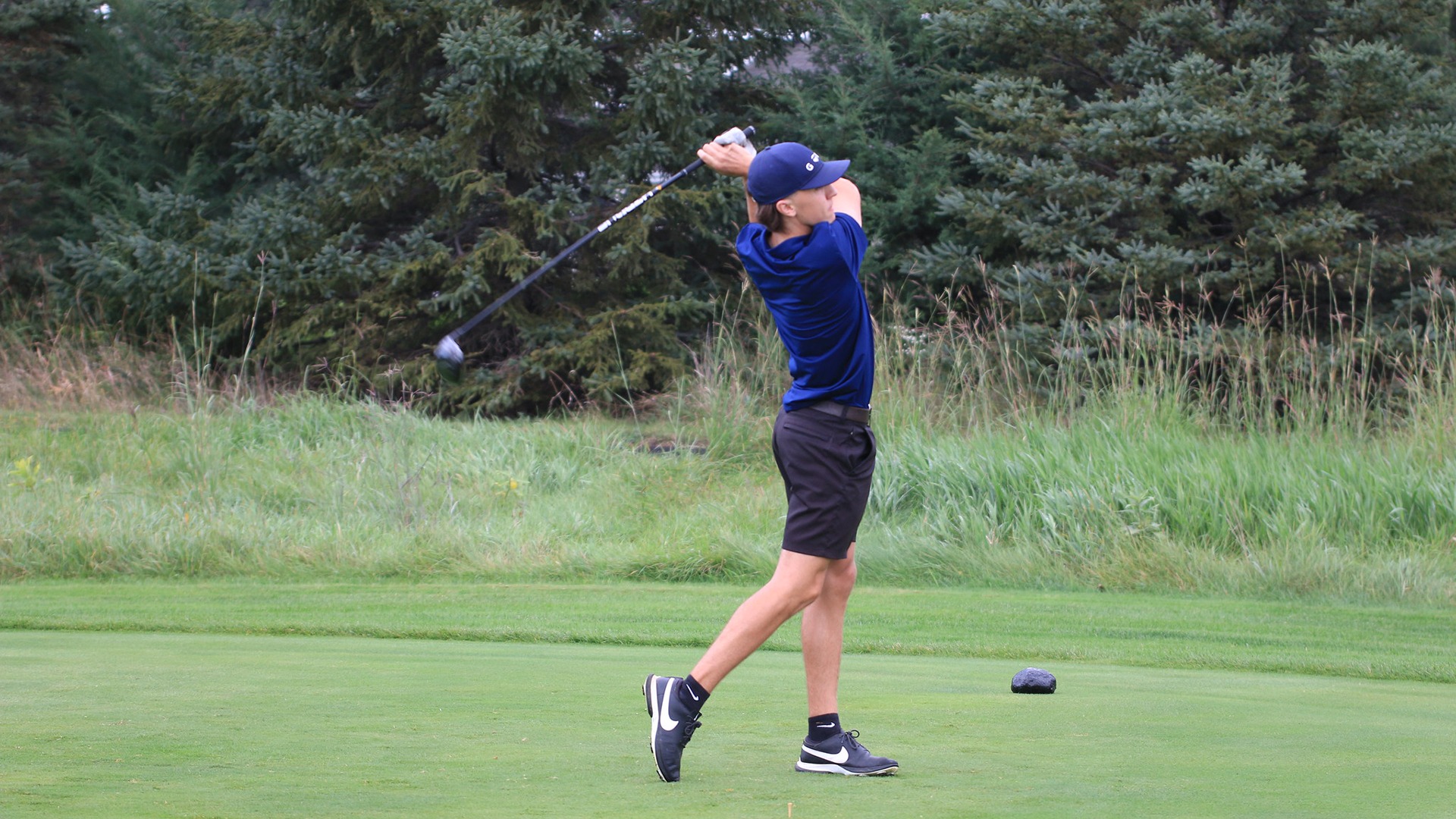 Kellan Jacobson finishes a drive