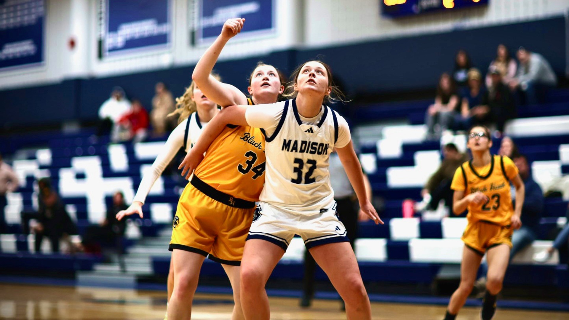 Maddi DeSmet blocks out for the rebound