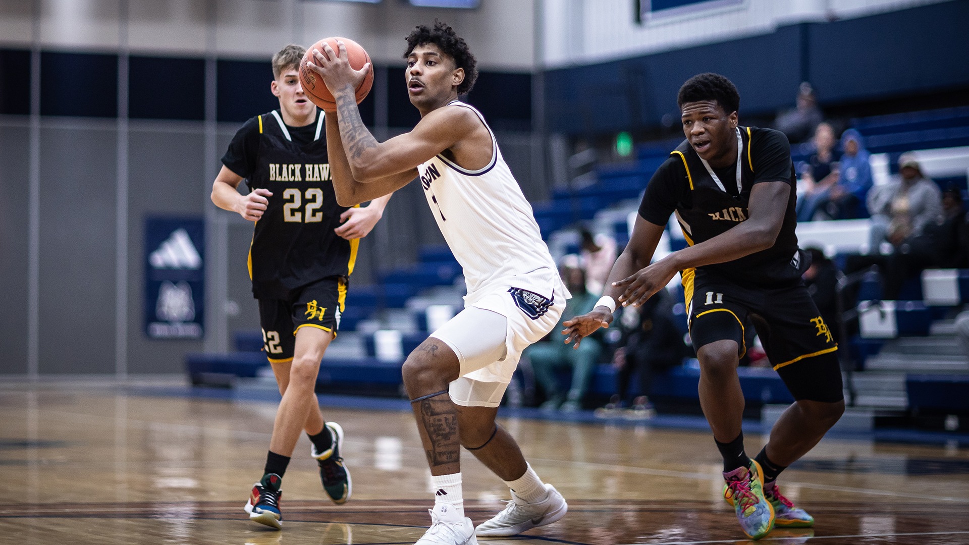 Noah Compan looks for an open teammate