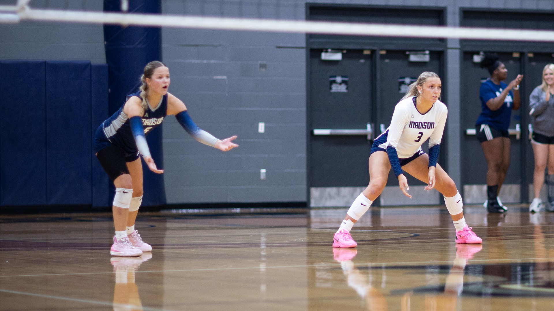 Ella Vosberg and Jaydon Golsteyn await the opponent's serve