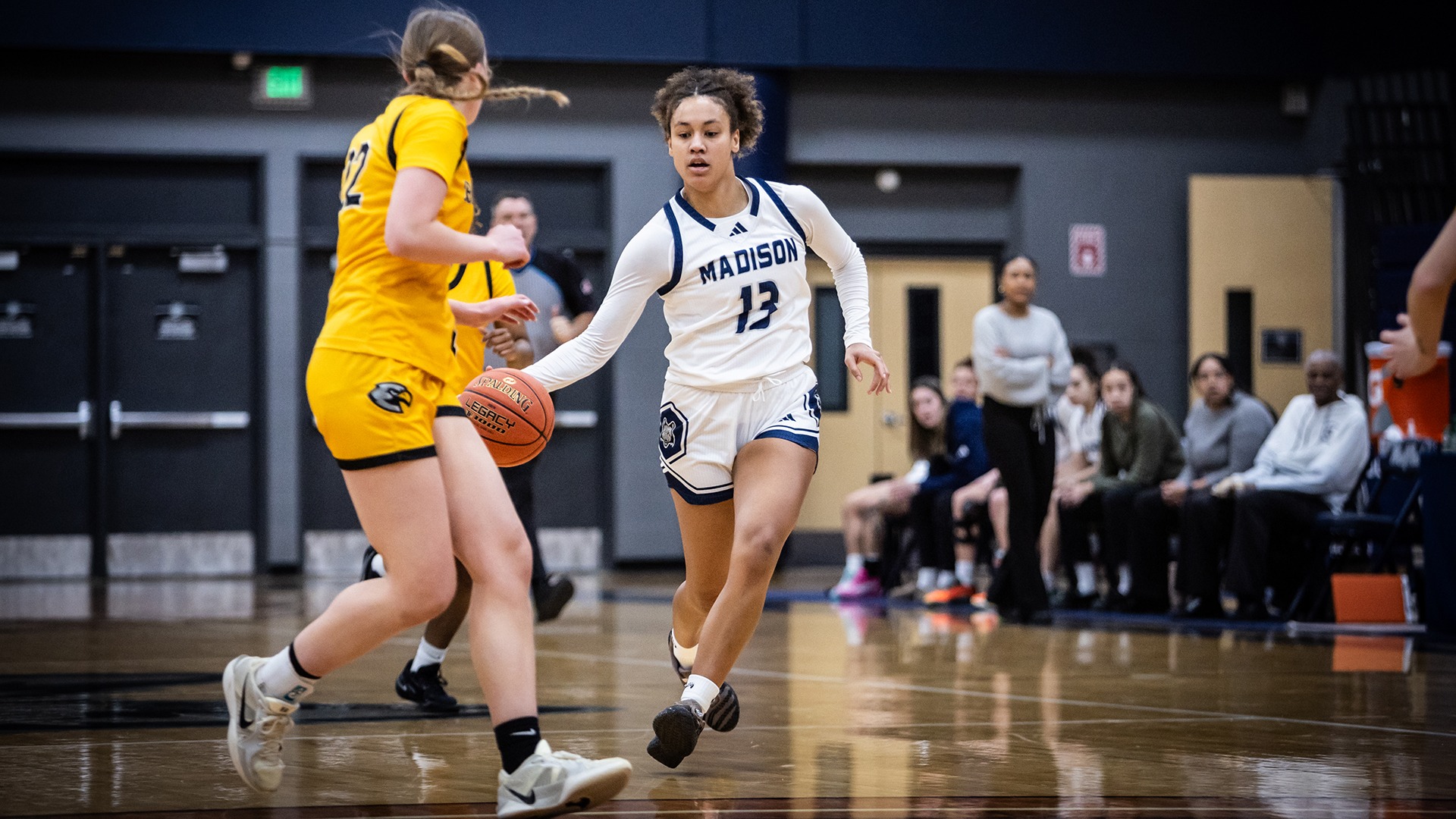 Maia Ellis dribbles the ball up the floor