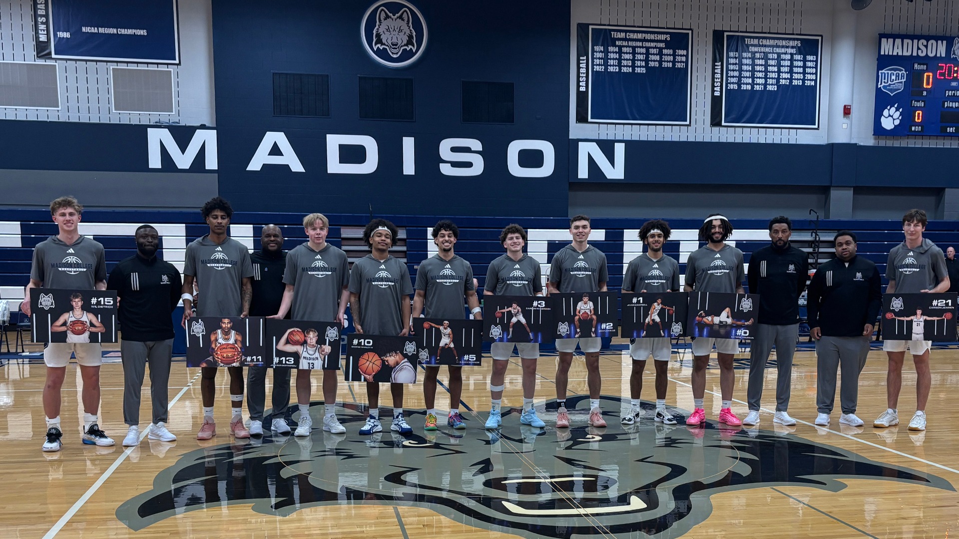 Ten men's basketball Sophomore Day 2026 honorees pose prior to the game