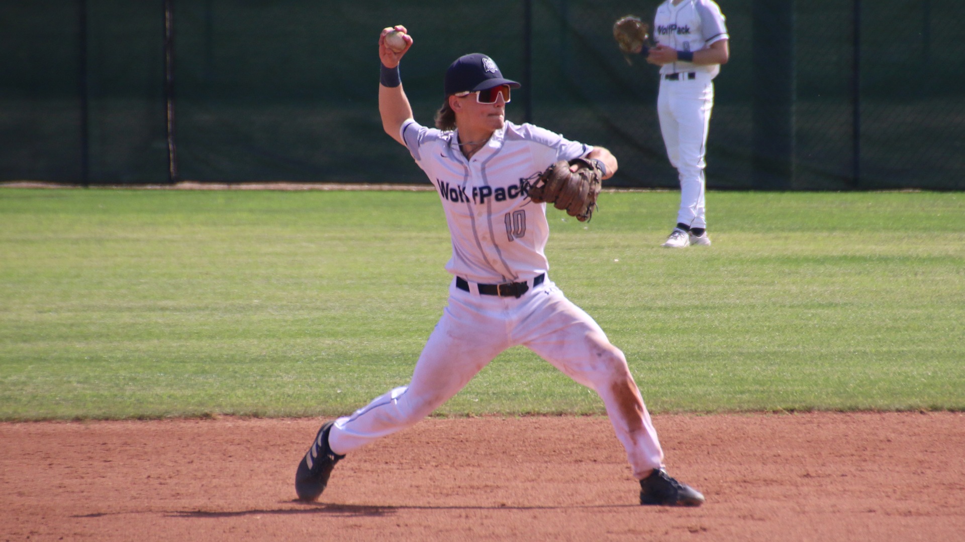 JJ Wolbert throws a ball to first base for the out