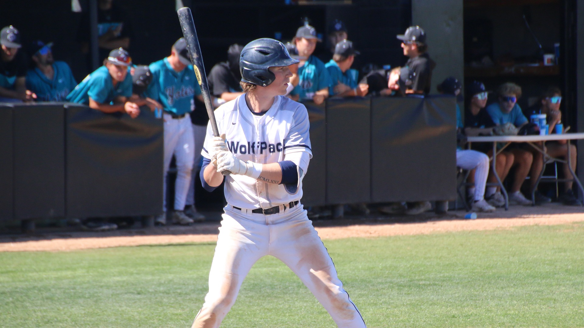 Matt Gruber stands ready with his bat and awaiting a pitch