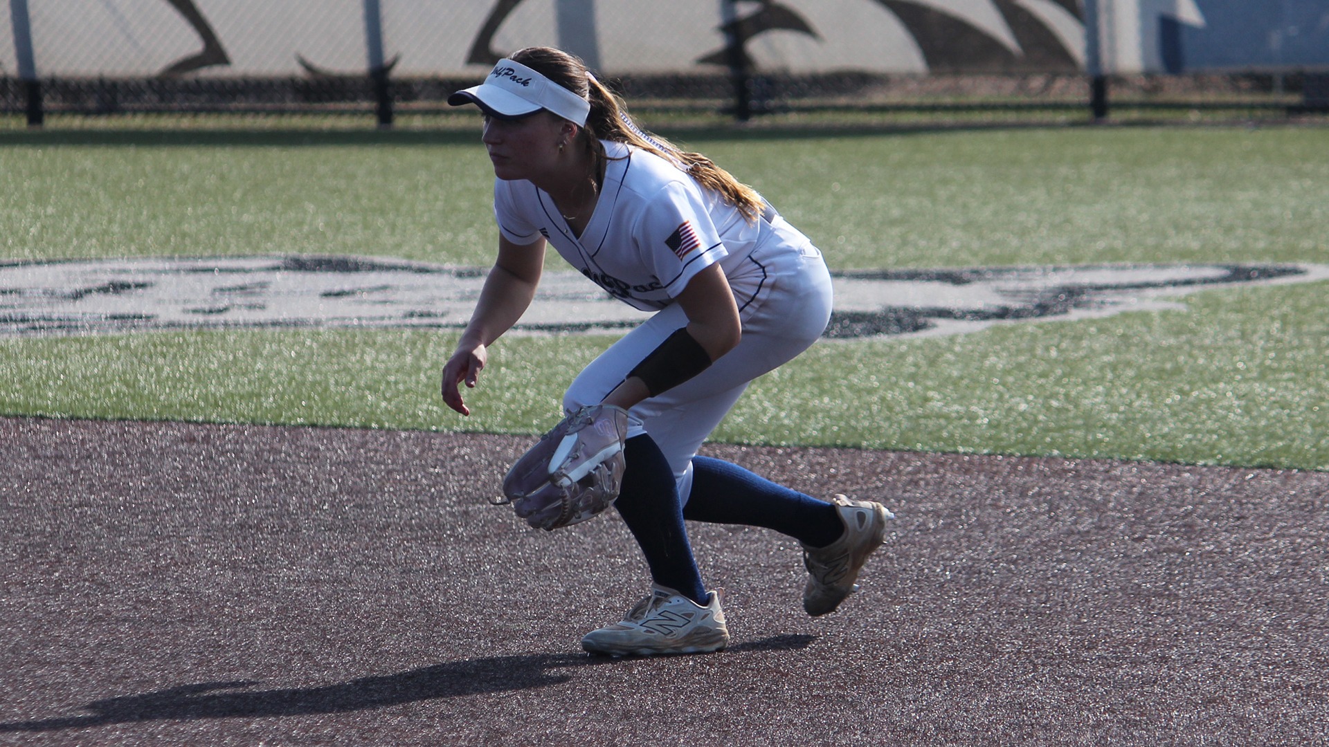 Shelby Brooks prepares defensively for a ball to be hit her way in the infield.