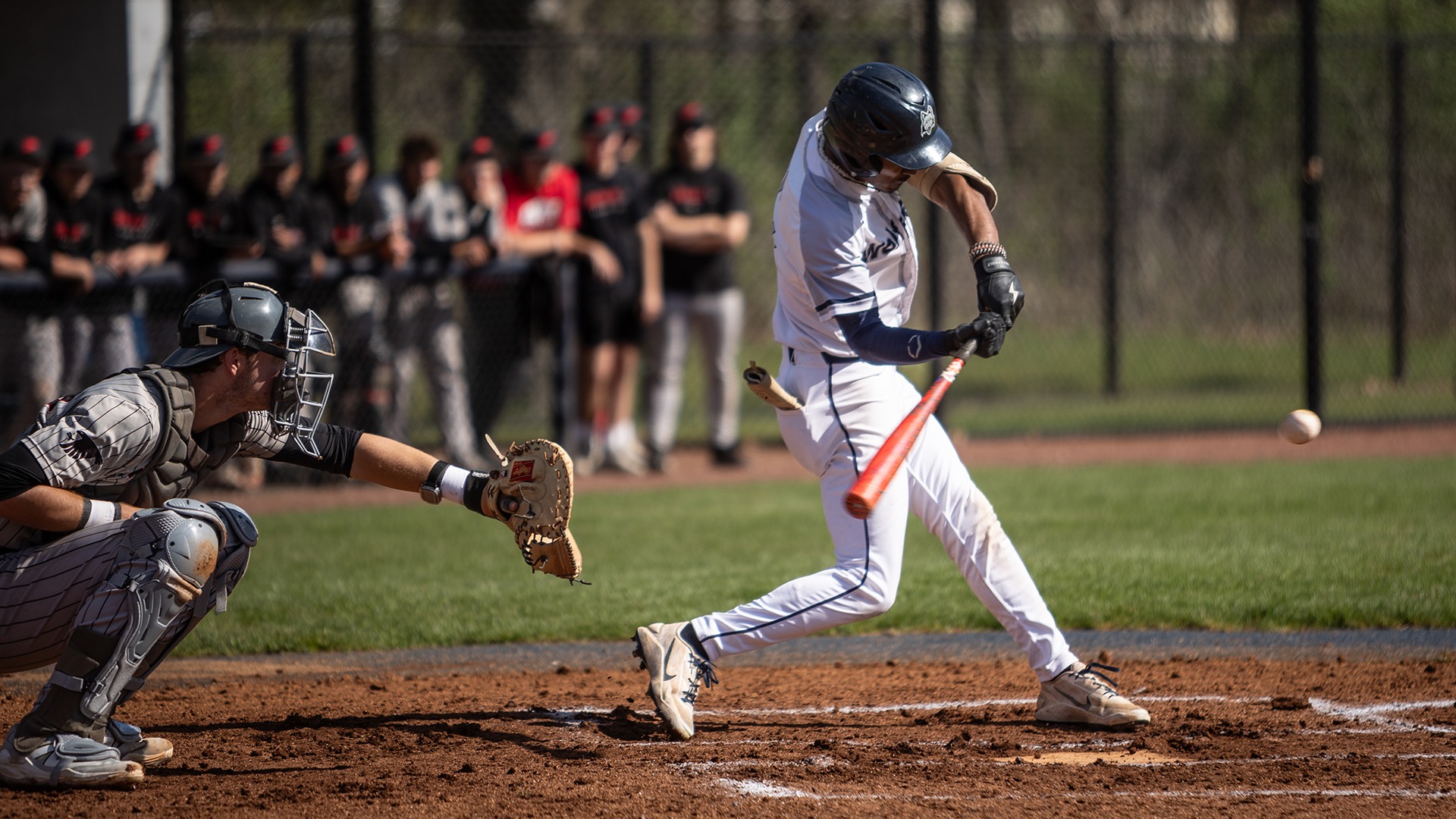 Braylen White swings at a pitch during a home game at Robin Roberts Field.