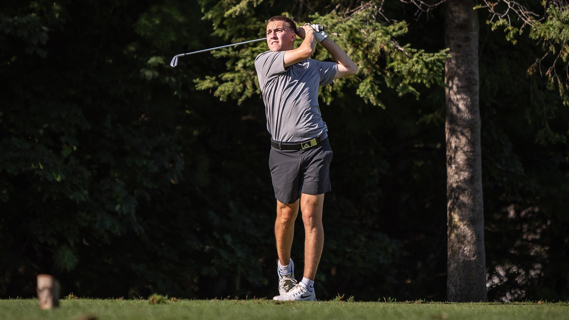 Kellan Jacobson holds his follow through following a tee shot