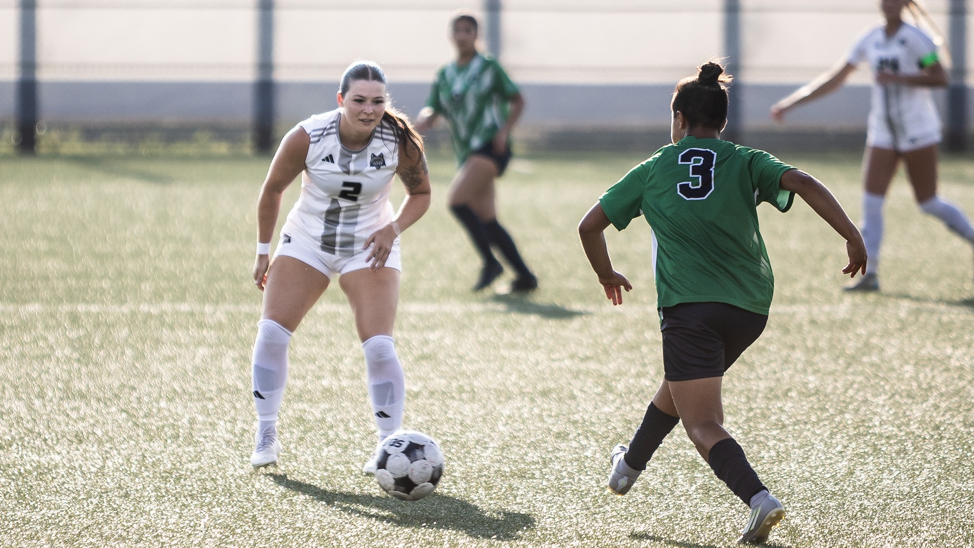Kylie Hellenbrand plays defense against an opponent with the ball