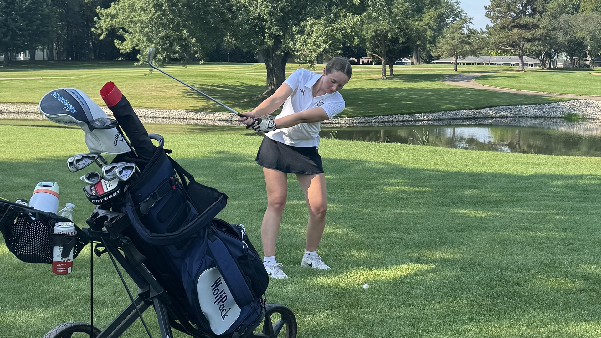 Delaina Nicewander begins her golf swing
