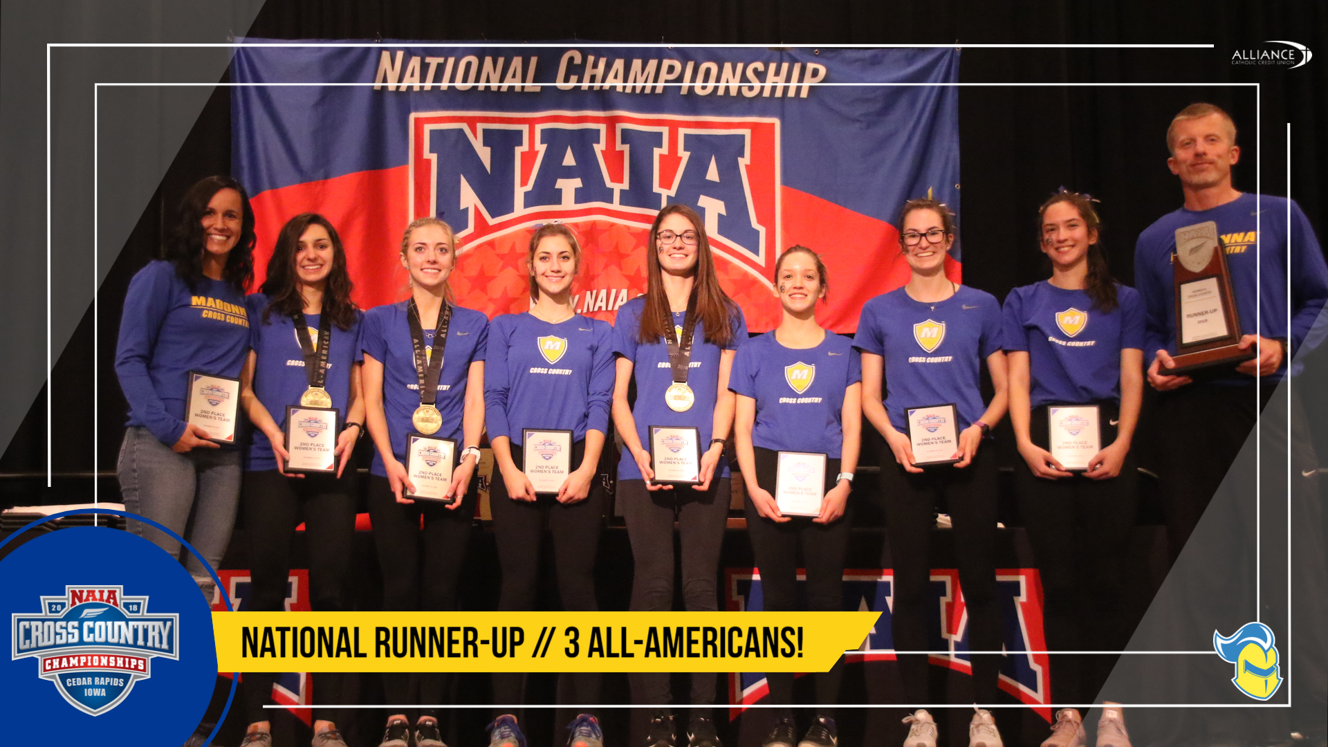 Women's Cross Country team poses with NAIA National Championship Runner-up trophy, place 2nd with 3 All-Americans