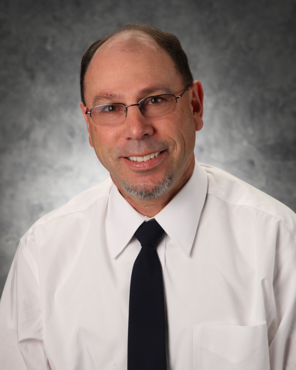 Portrait of assistant cross country coach william huntington
