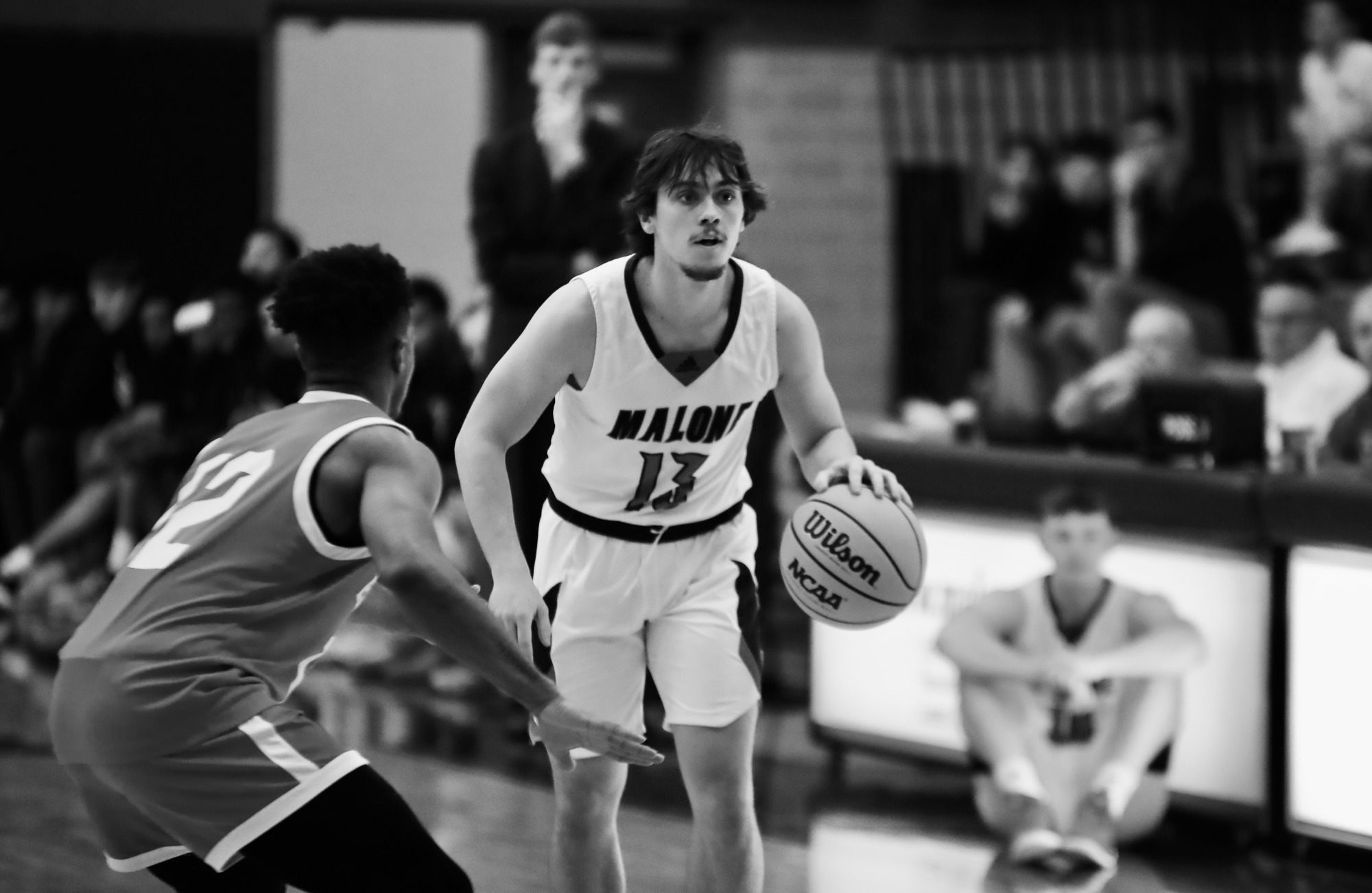 Men's Basketball Hangs On to Beat Hillsdale Malone University Athletics