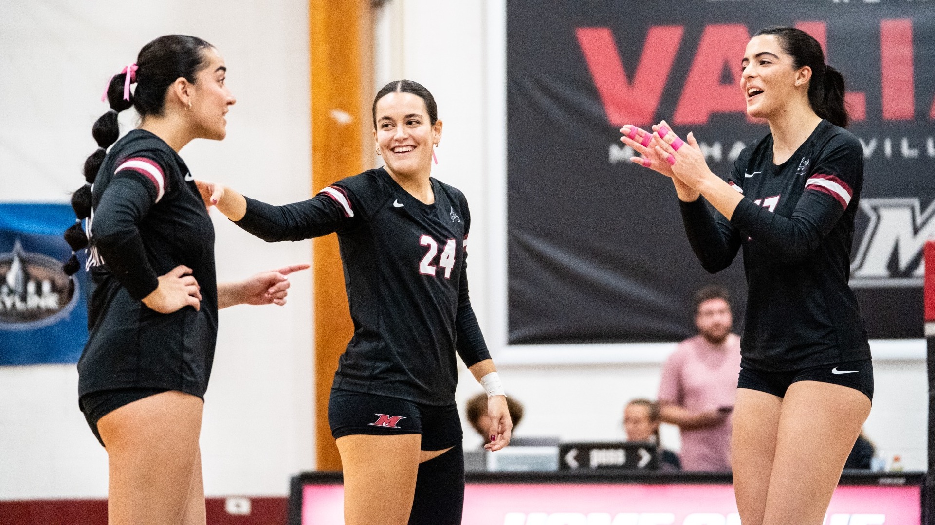 Caylin, Aurea and Monika celebrate a point