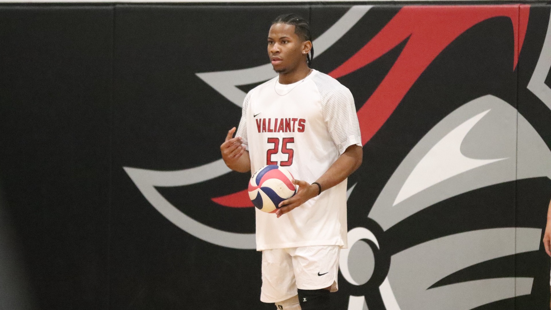 Kyle Simmons readies to serve