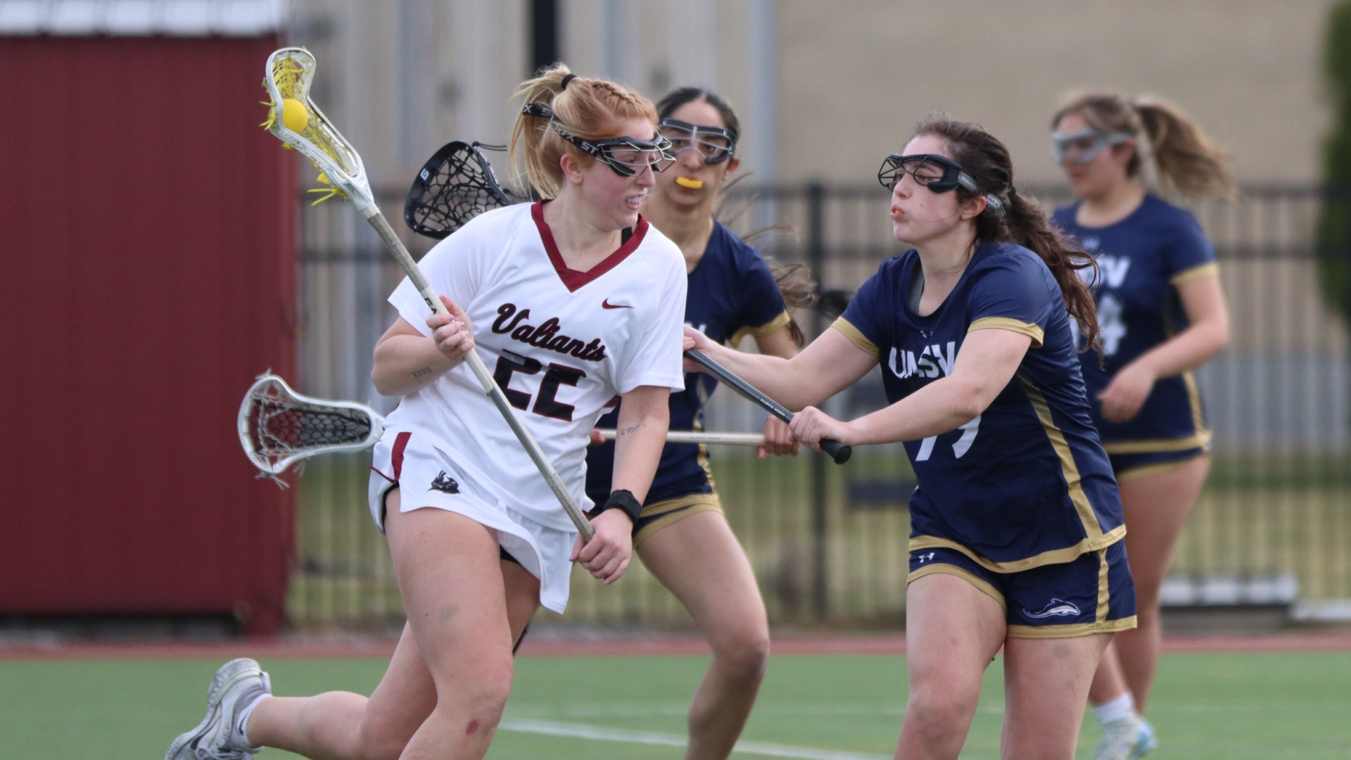 Kaci Pierce drives to the net against Mount Saint Vincent