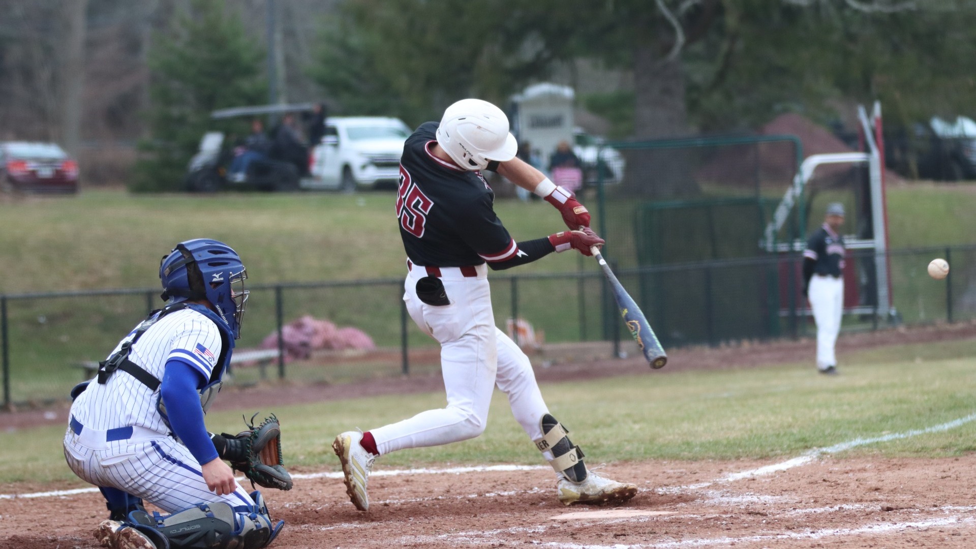 Szober batting, hitting the ball