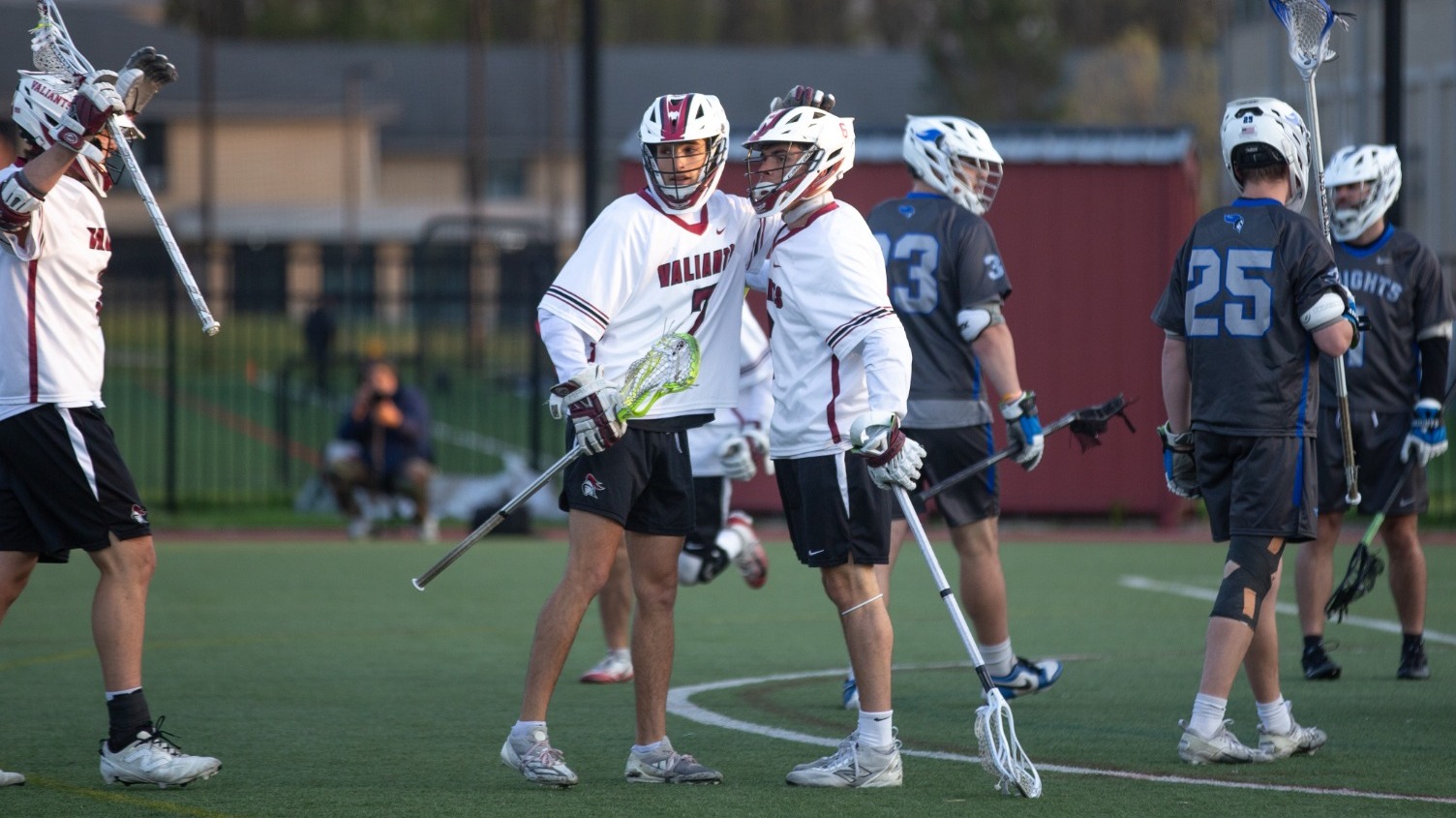 Corace and Berch celebrating a goal
