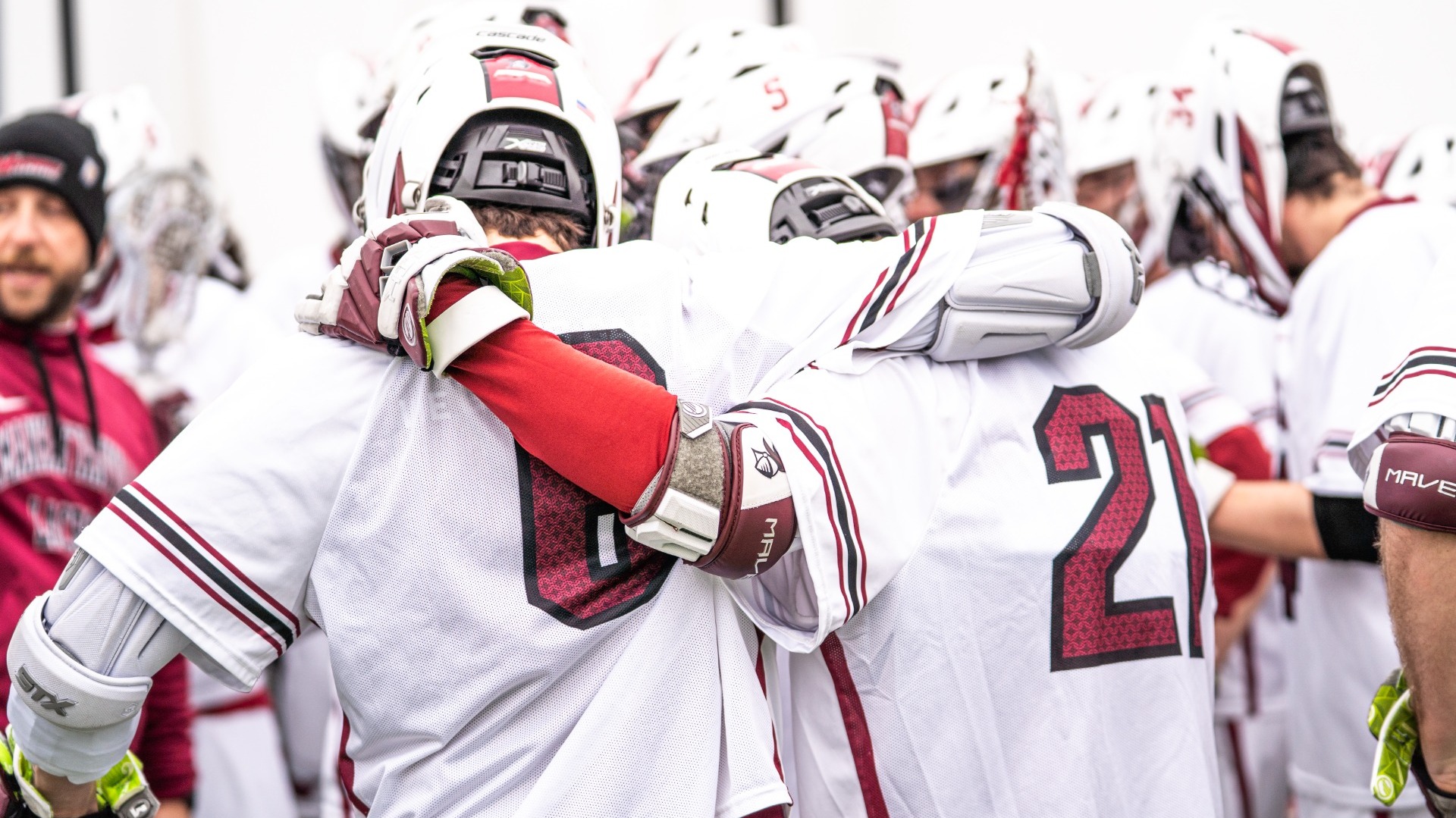 Men's lacrosse pregam huddle