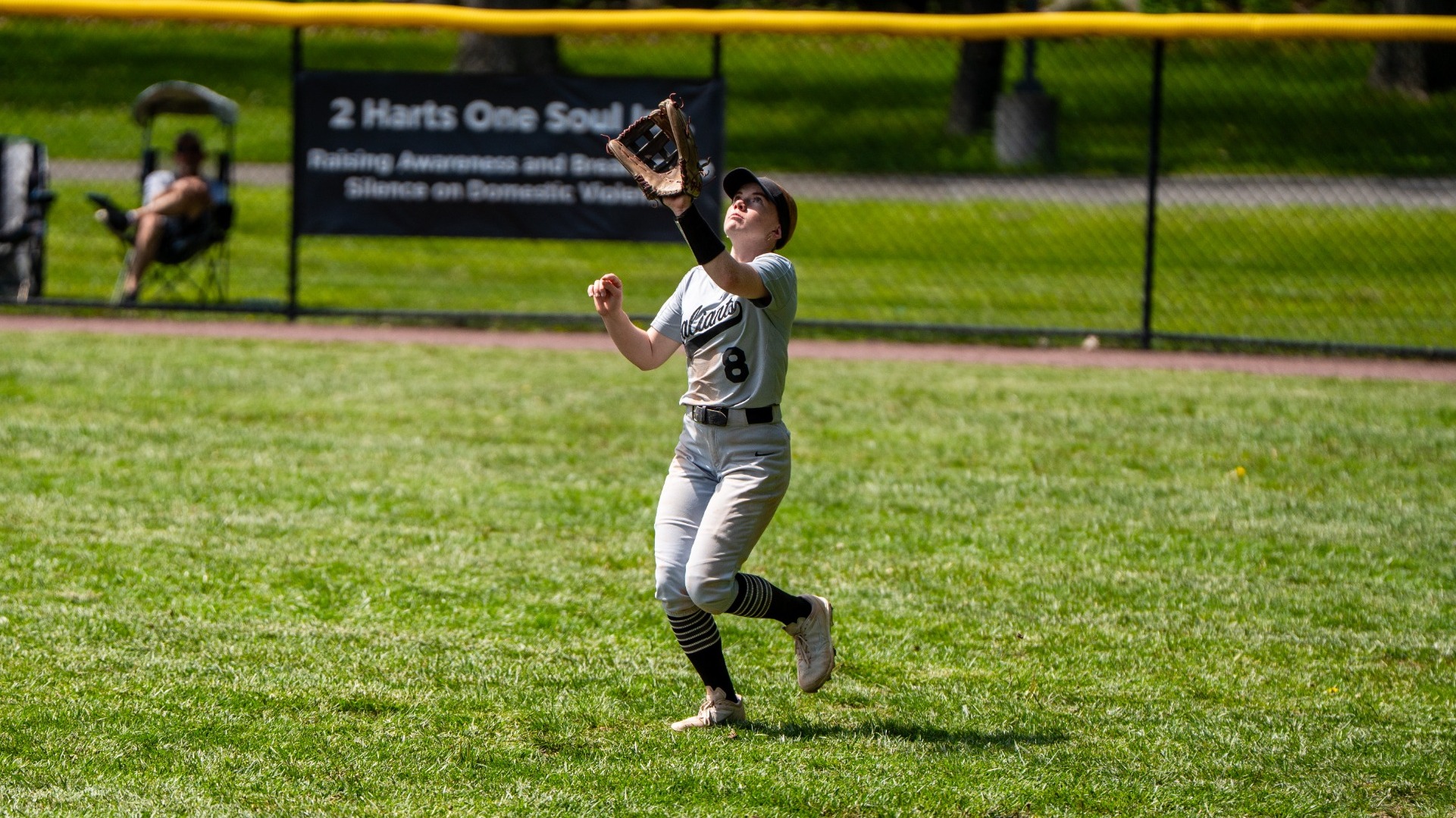 Emma Foster readies to catch a fly ball