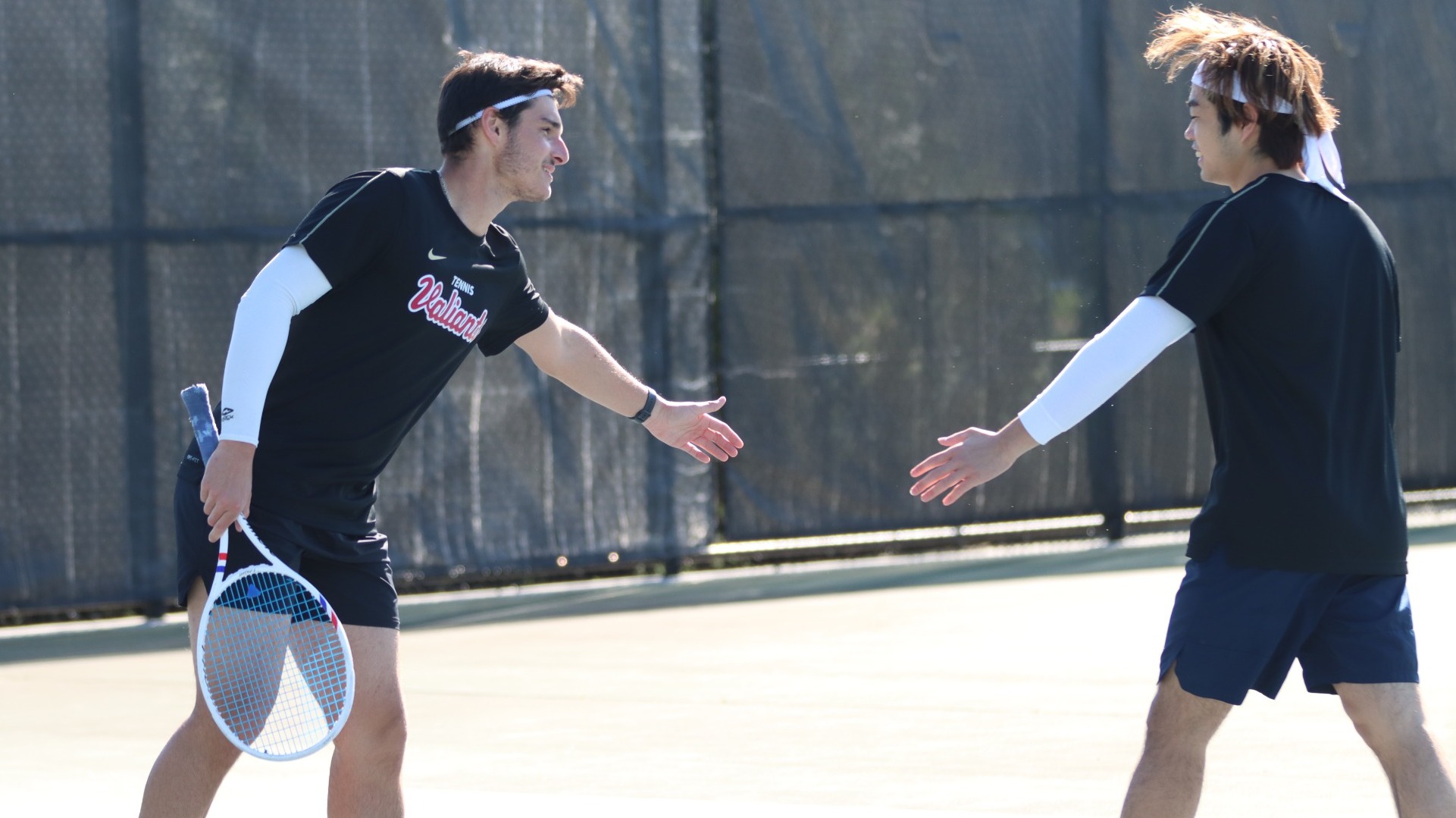 Thomas Jouanneau and Kazuma Kato high-five