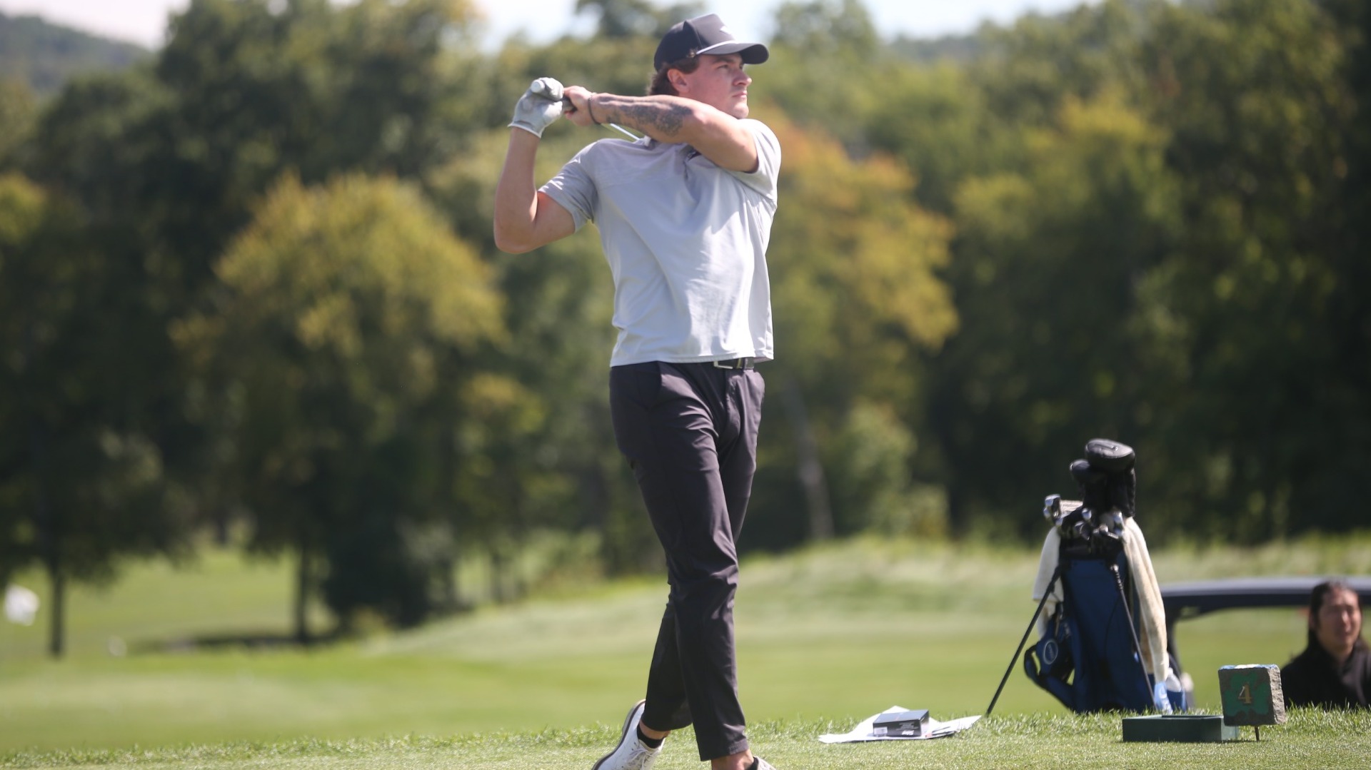 Tyler Rolston drives off the tee box