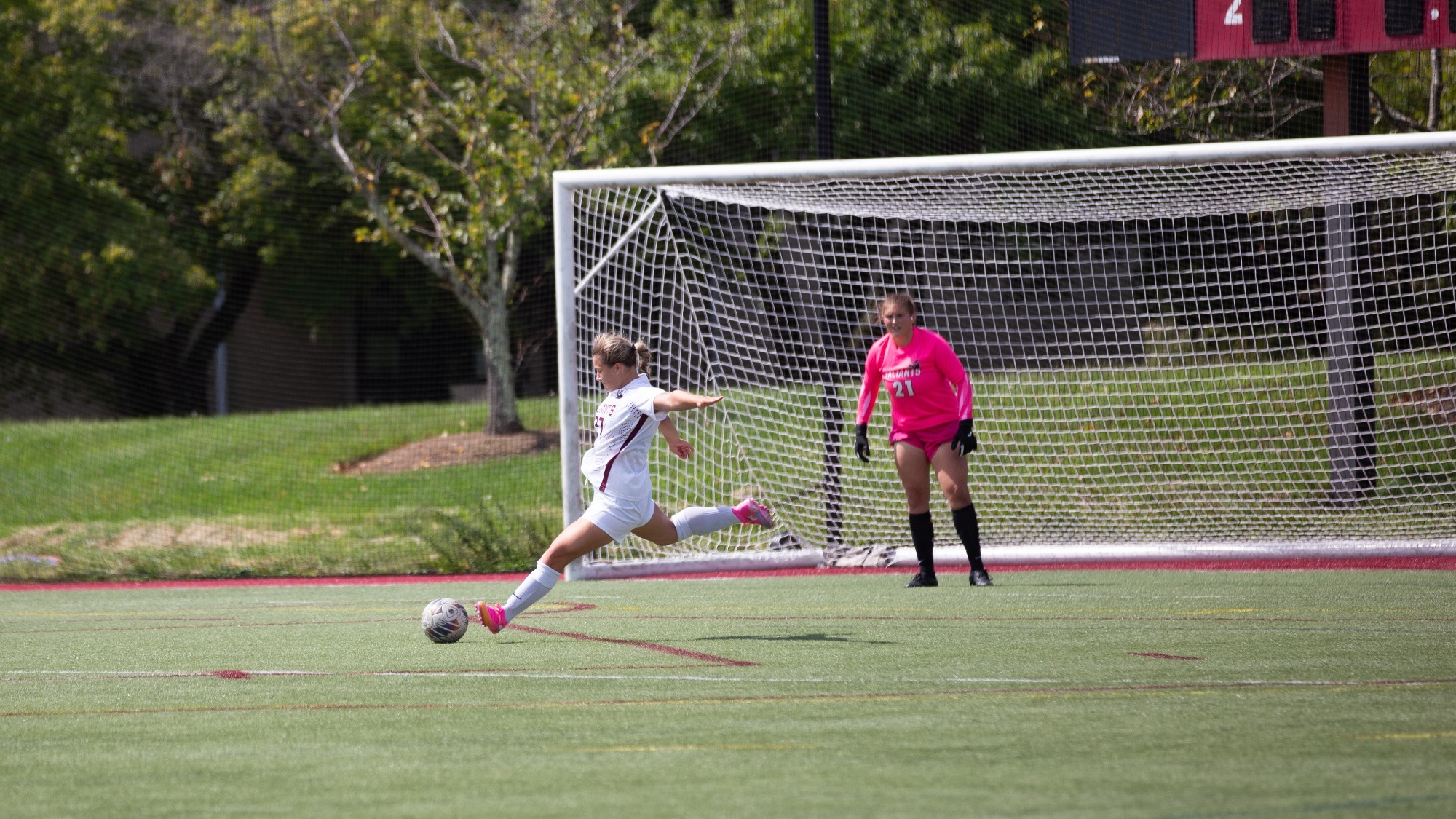 audrey kicking soccer ball