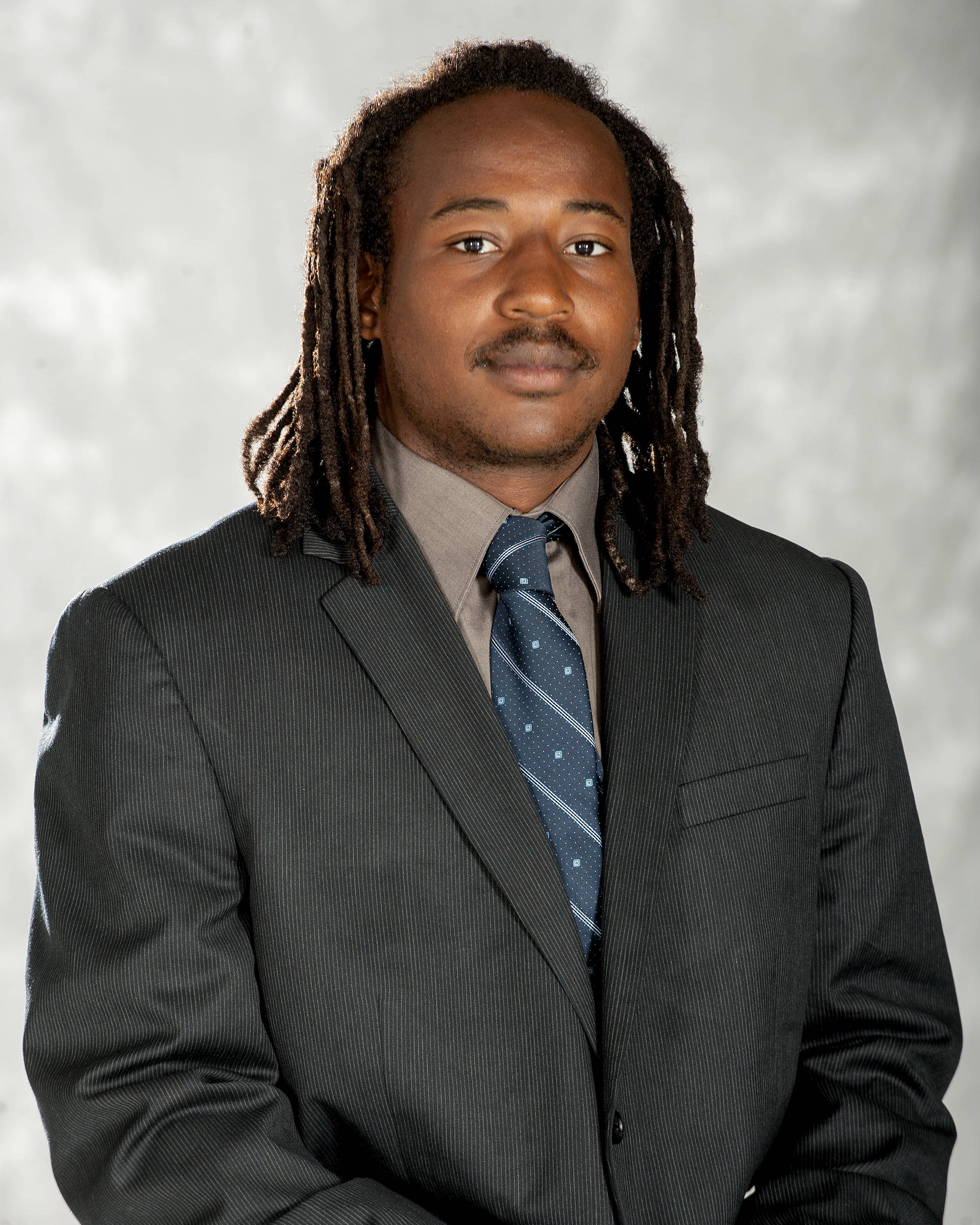 Headshot image of football student-athlete Darius Hill