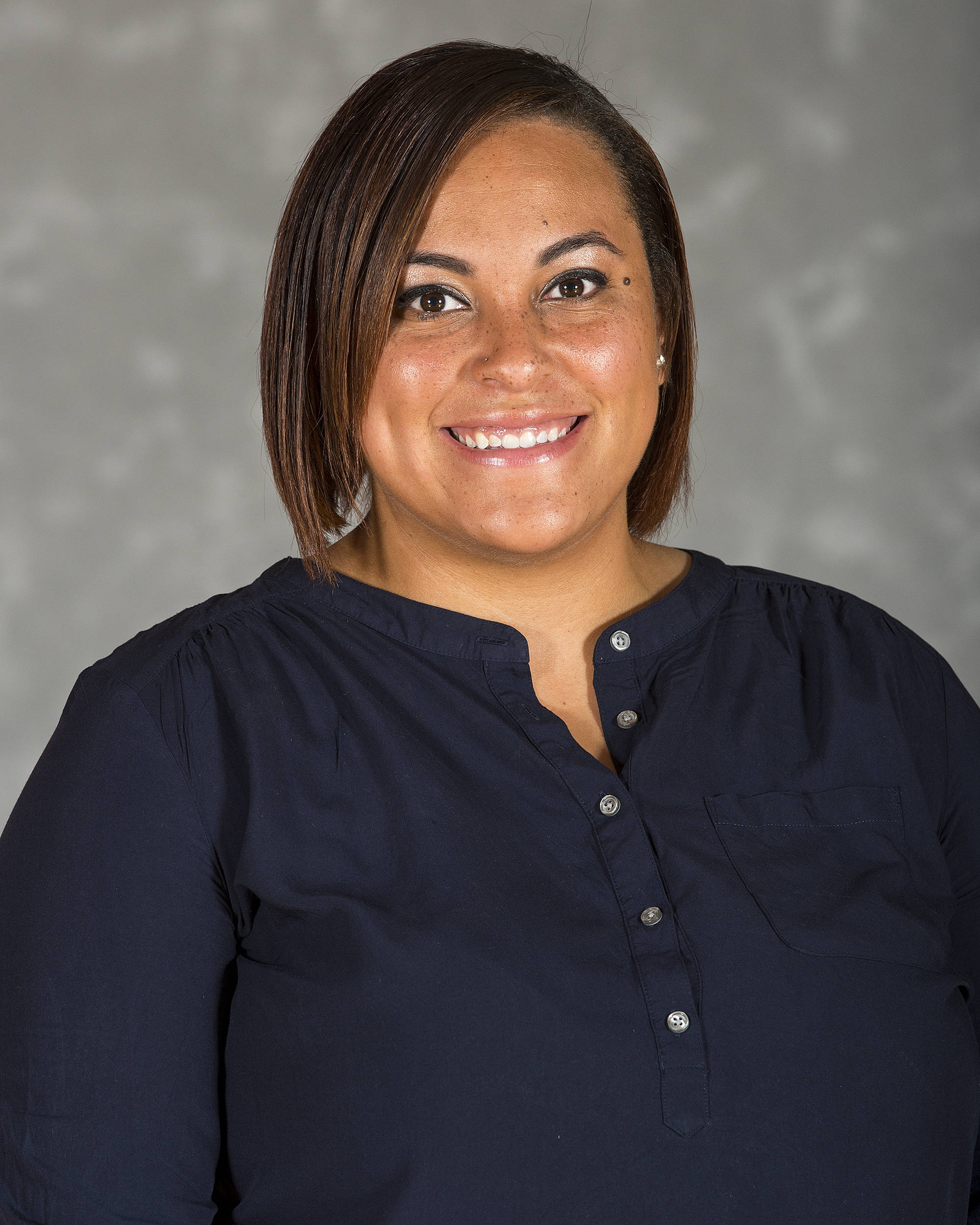 Headshot image of women's basketball coach Dominique Bryant