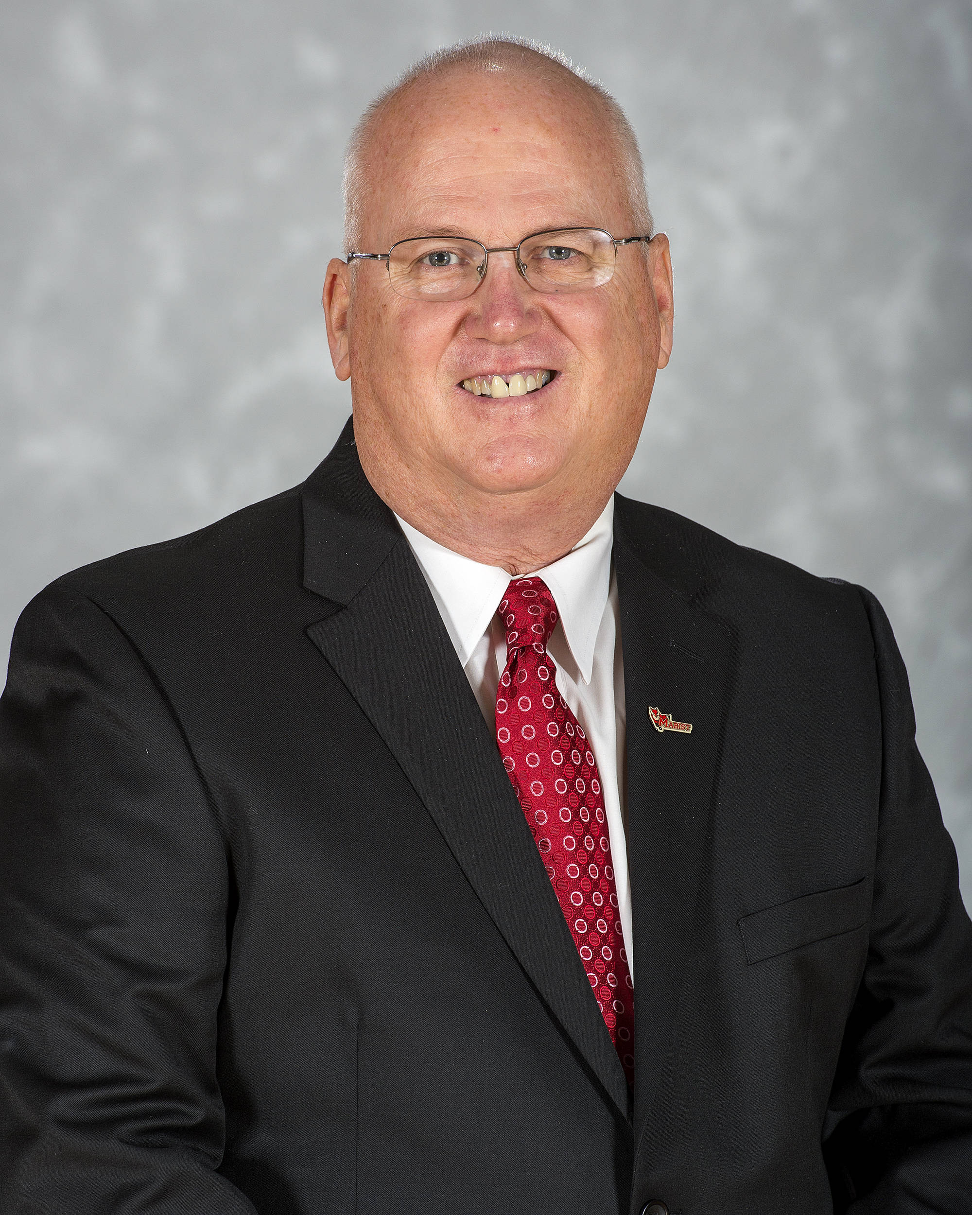 Headshot image of women's basketball head coach Brian Giorgis 