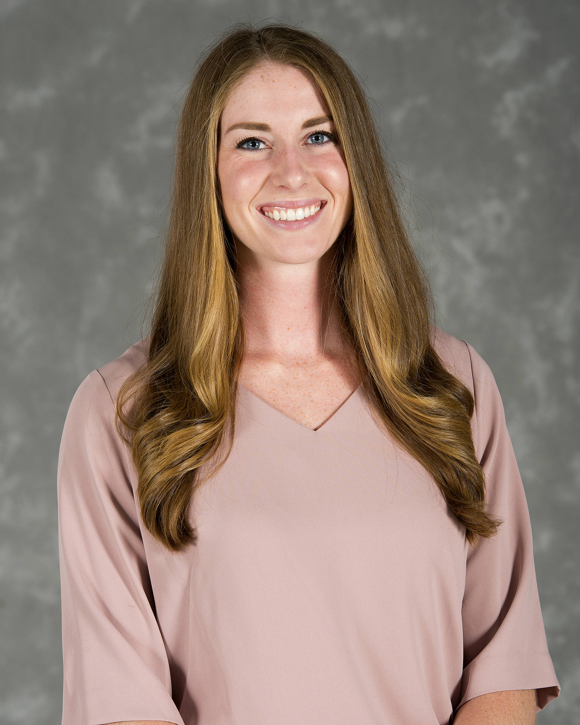 Headshot image of women's volleyball coach Ali Berens