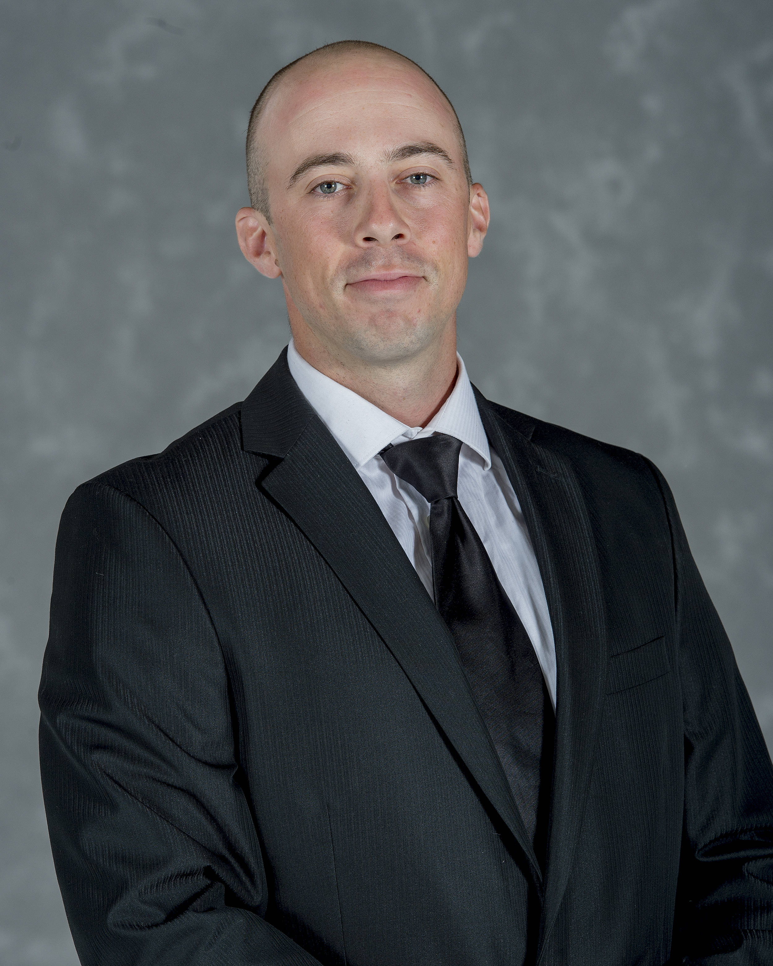 Headshot image of football coach Billy Creed