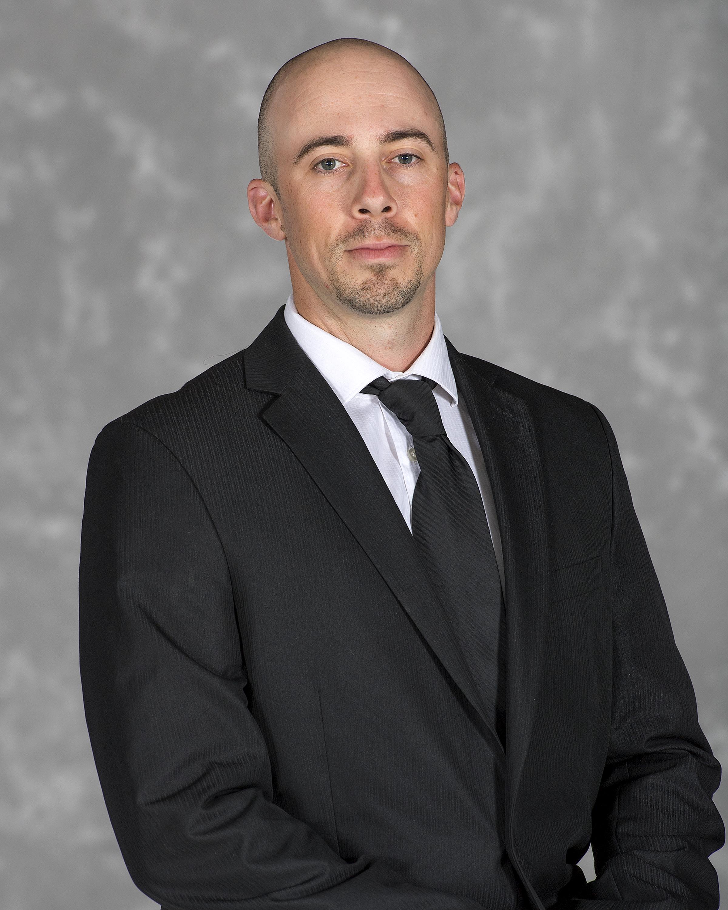 Head shot image of football assistant coach Bill Creed