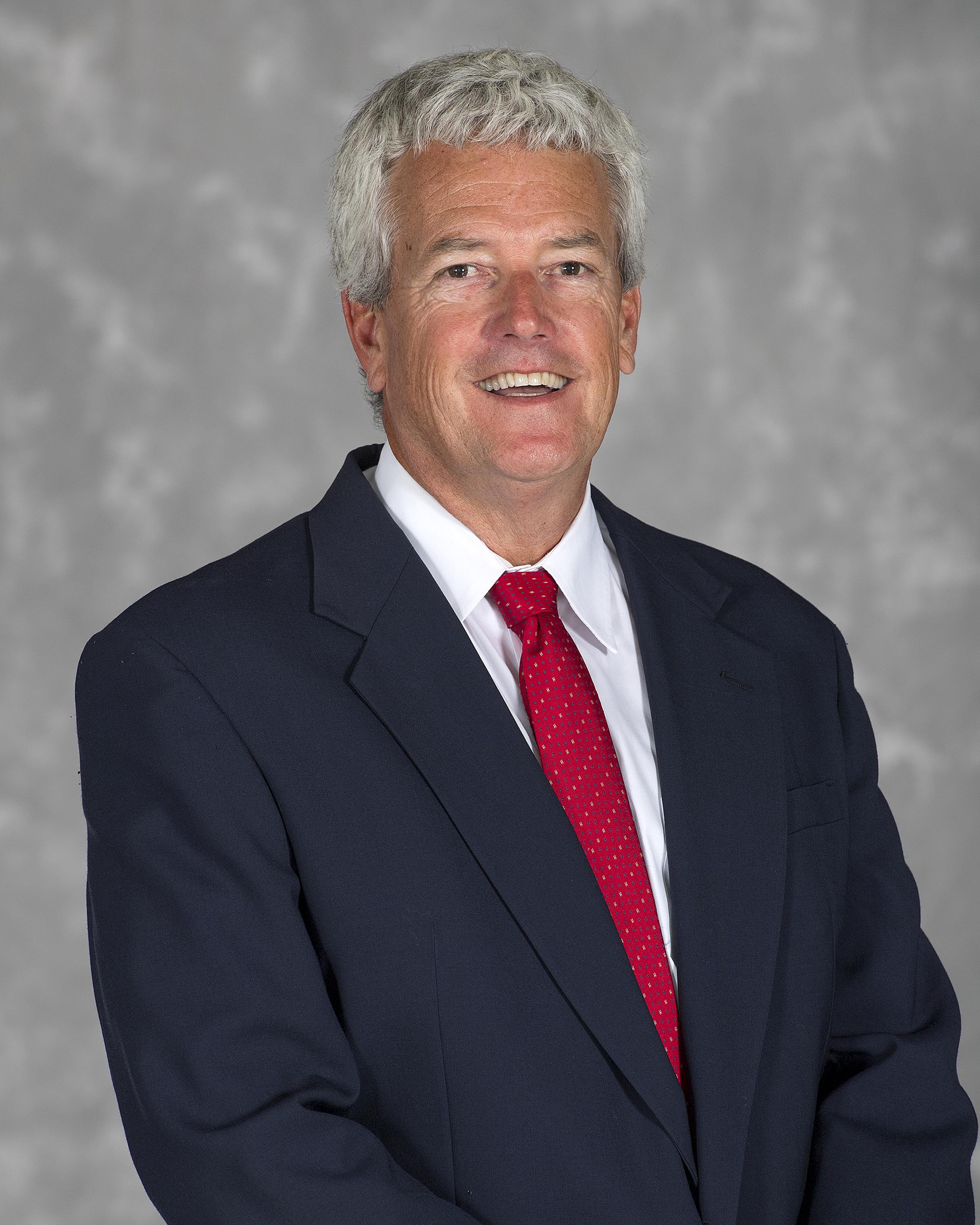 Head shot image of football head coach Jim Parady