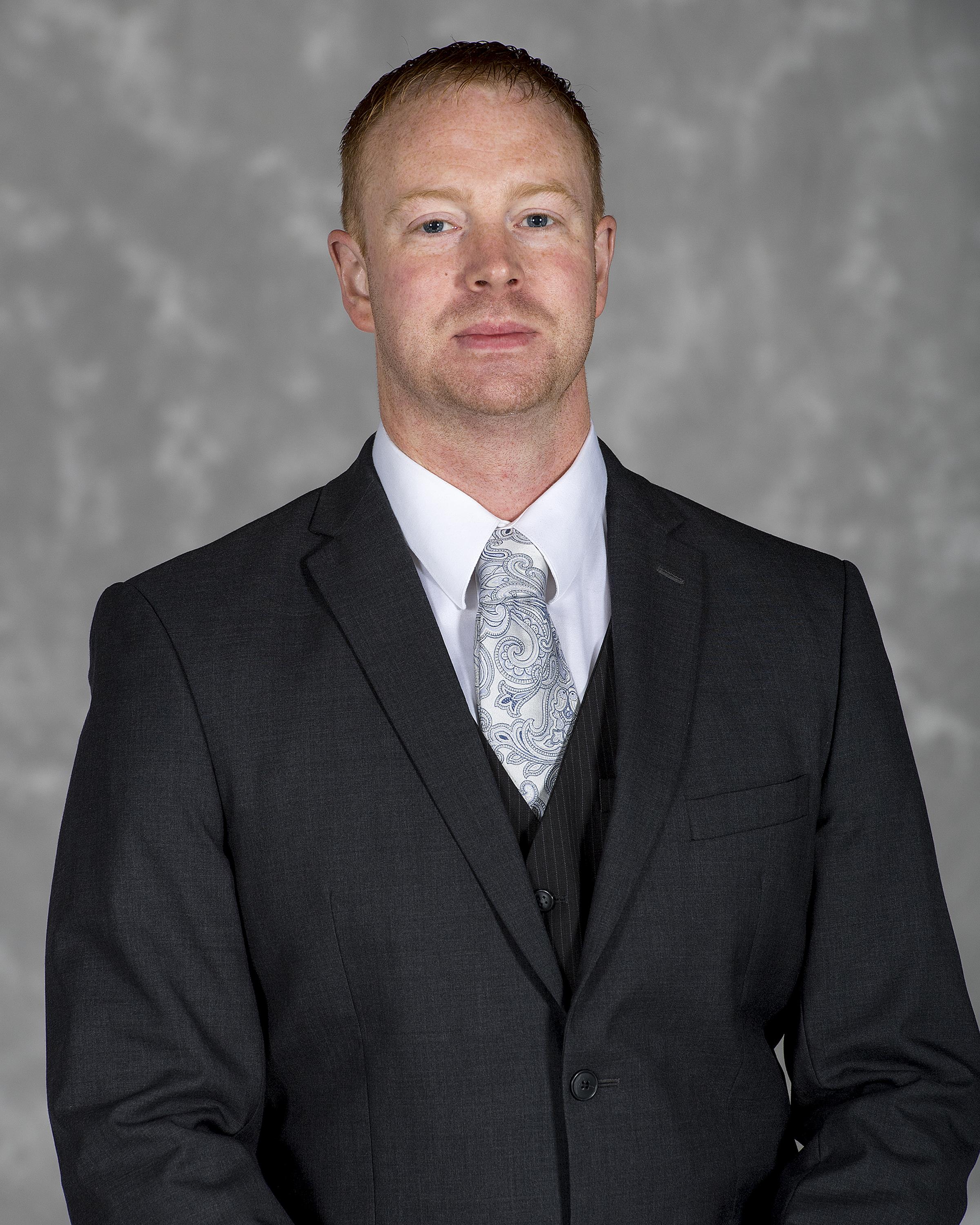 Headshot image of strength and conditioning coach Aaron Suma